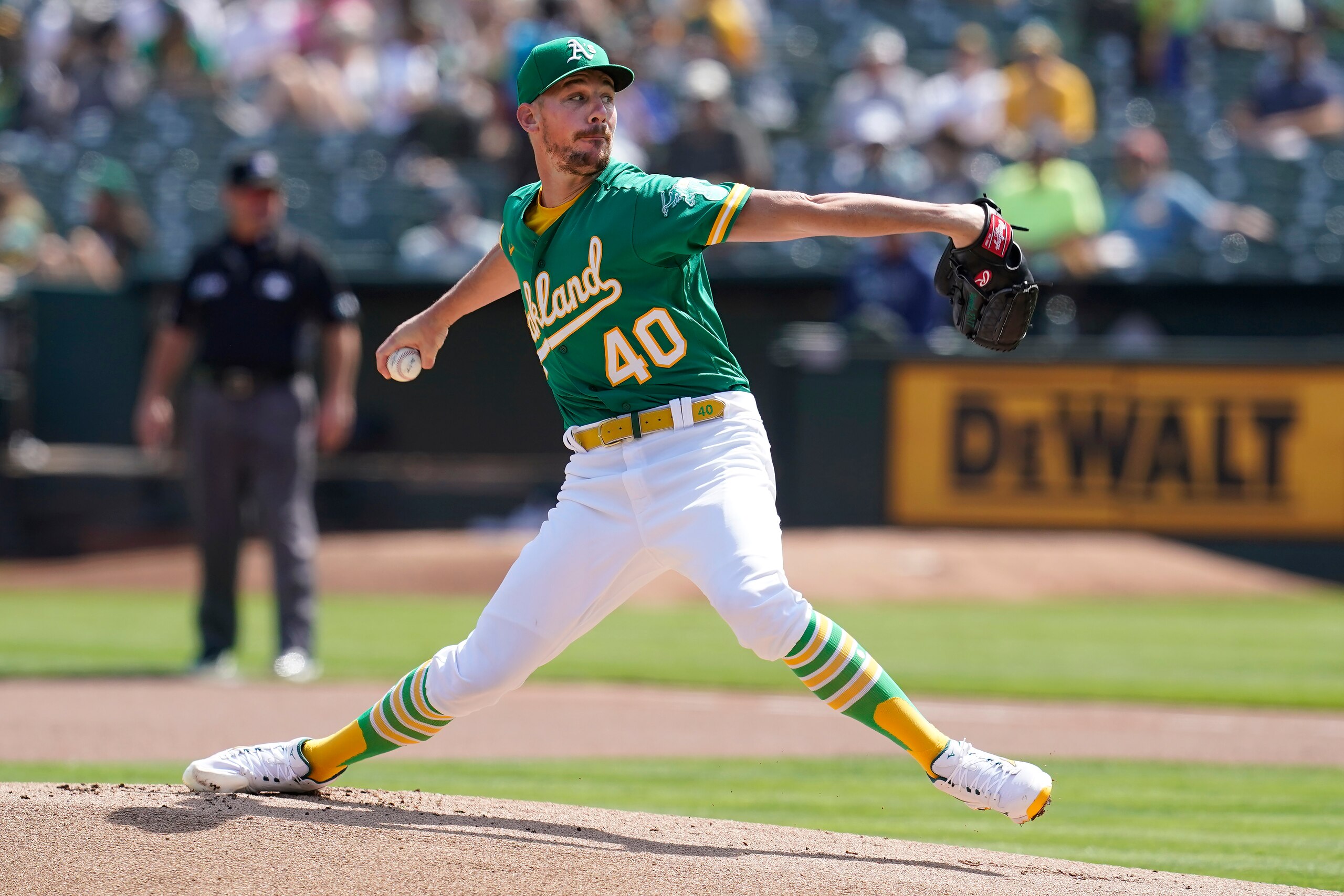 Oakland Athletics' Chris Bassitt pitches against the Seattle Mariners during the first inning of a baseball game in Oakland, Calif., Thursday, Sept. 23, 2021. (AP Photo/Jeff Chiu)