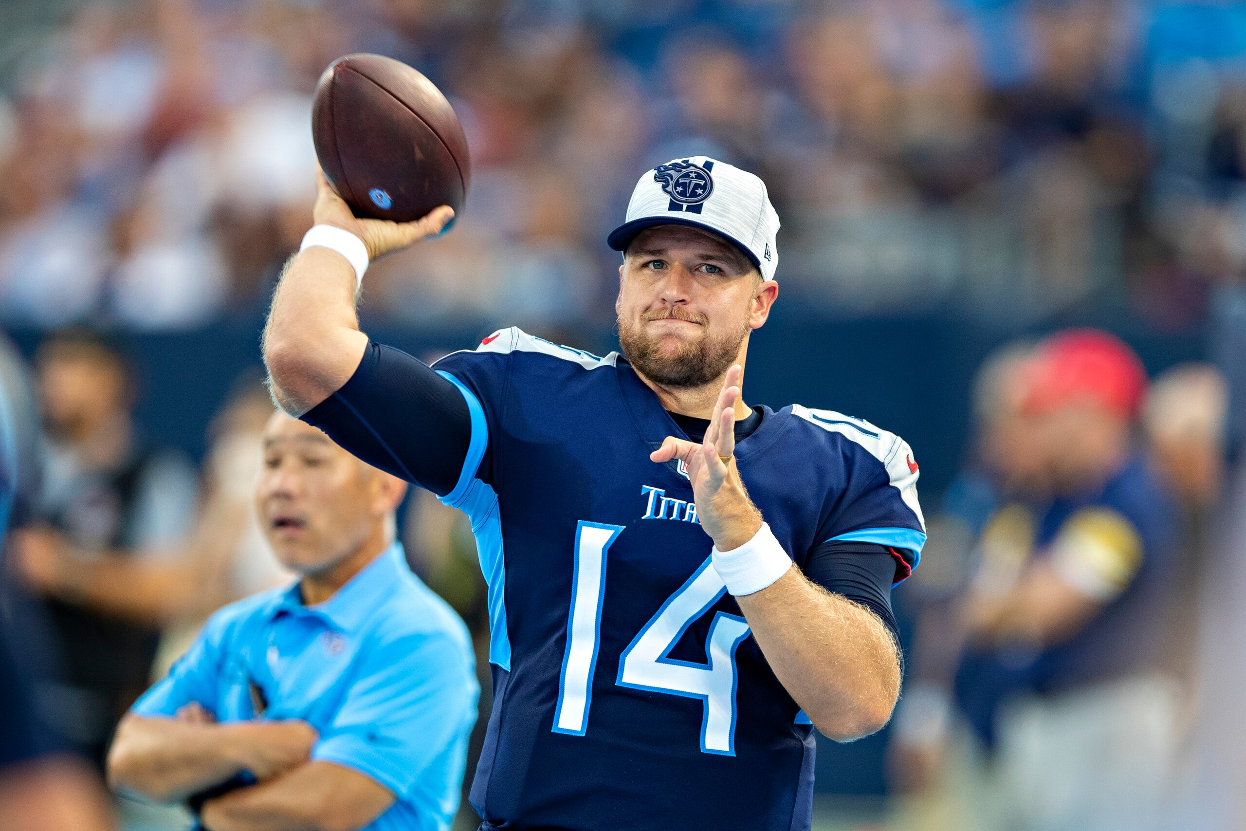 NASHVILLE, TN - AUGUST 28:  Matt Barkley #14 of the Tennessee Titans warms up on the sidelines during an NFL preseason game against the Chicago Bears at Nissan Stadium on August 28, 2021 in Nashville, Tennessee.  (Photo by Wesley Hitt/Getty Images)