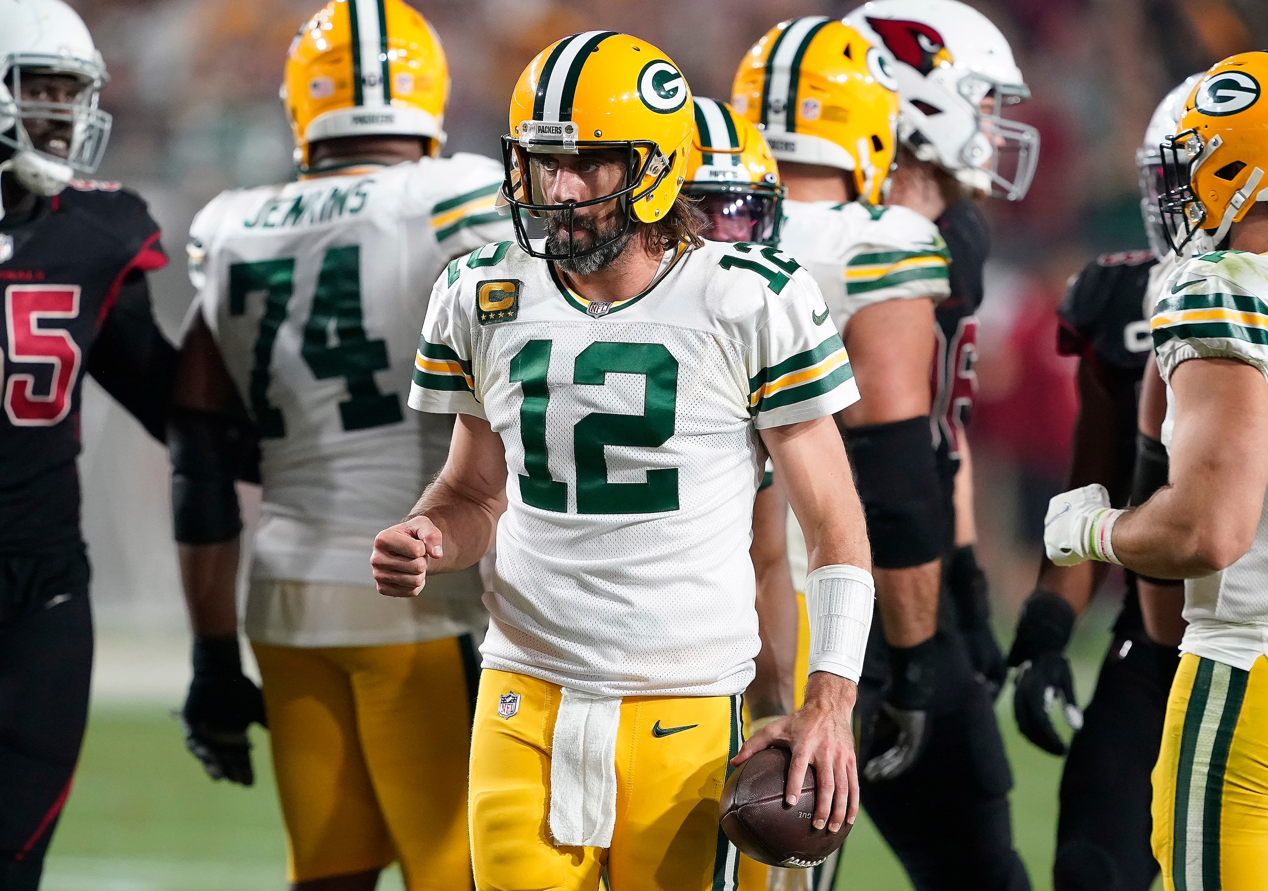 Green Bay Packers quarterback Aaron Rodgers (12) celebrates their 24-21 win over the Arizona Cardinals during an NFL football game Thursday, Oct. 28, 2021, in Glendale, Ariz. (AP Photo/Darryl Webb)