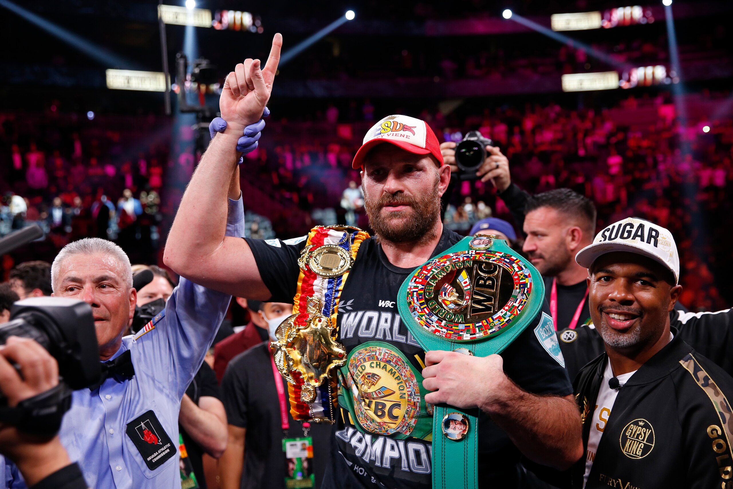 Tyson Fury, of England, celebrates after defeating Deontay Wilder in a heavyweight championship boxing match Saturday, Oct. 9, 2021, in Las Vegas. (AP Photo/Chase Stevens)