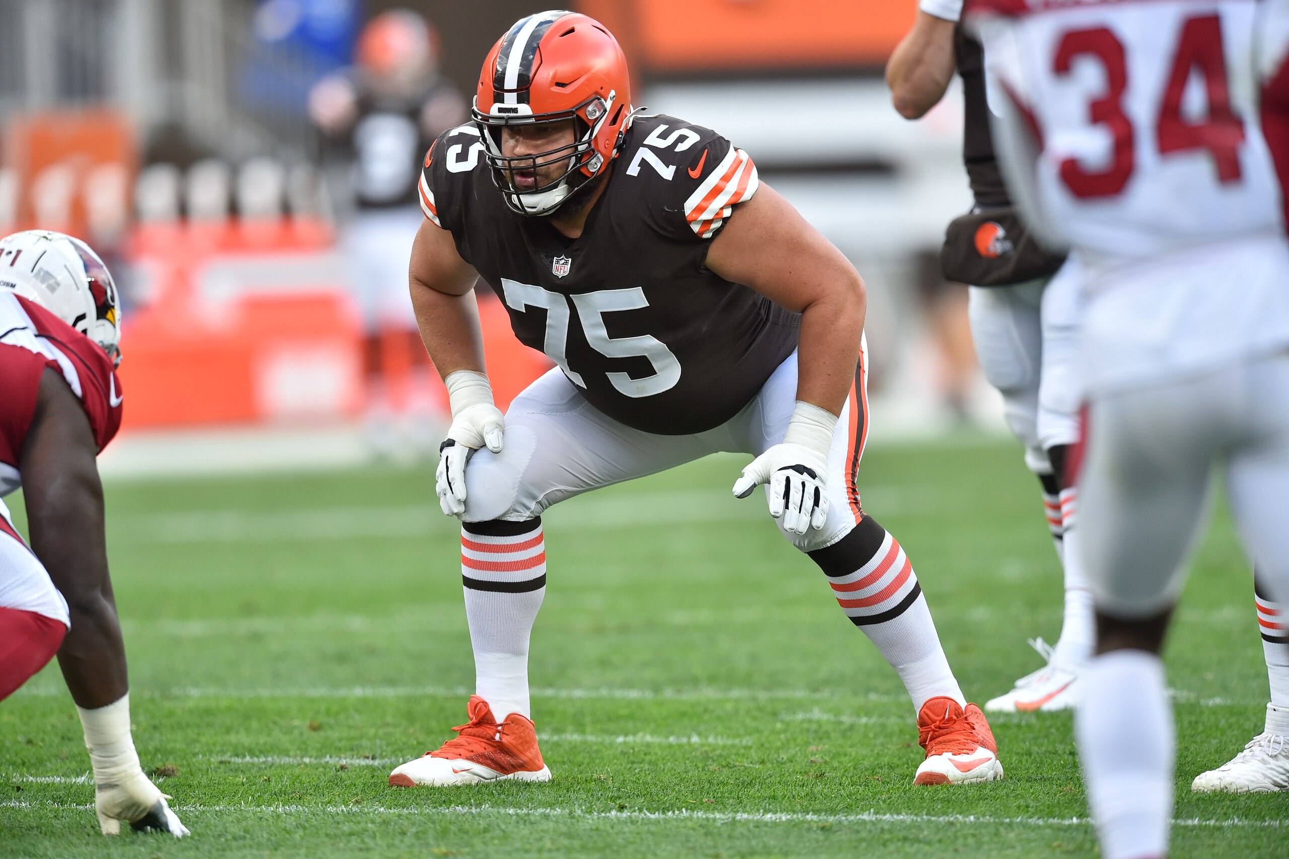 Cleveland Browns offensive guard Joel Bitonio (75) blocks during an NFL football game against the Arizona Cardinals, Sunday, Oct. 17, 2021, in Cleveland. The Cardinals won 37-14. (AP Photo/David Richard) Cleveland Browns offensive guard Joel Bitonio (75) blocks during an NFL football game against the Arizona Cardinals, Sunday, Oct. 17, 2021, in Cleveland. The Cardinals won 37-14. (AP Photo/David Richard)