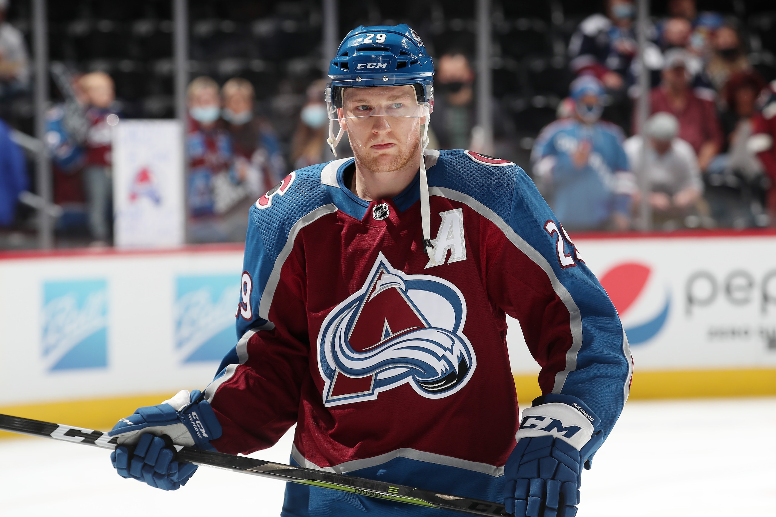 DENVER, COLORADO - NOVEMBER 03: Nathan MacKinnon #29 of the Colorado Avalanche looks on prior to the game against the Columbus Blue Jackets at Ball Arena on November 03, 2021 in Denver, Colorado. (Photo by Michael Martin/NHLI via Getty Images)