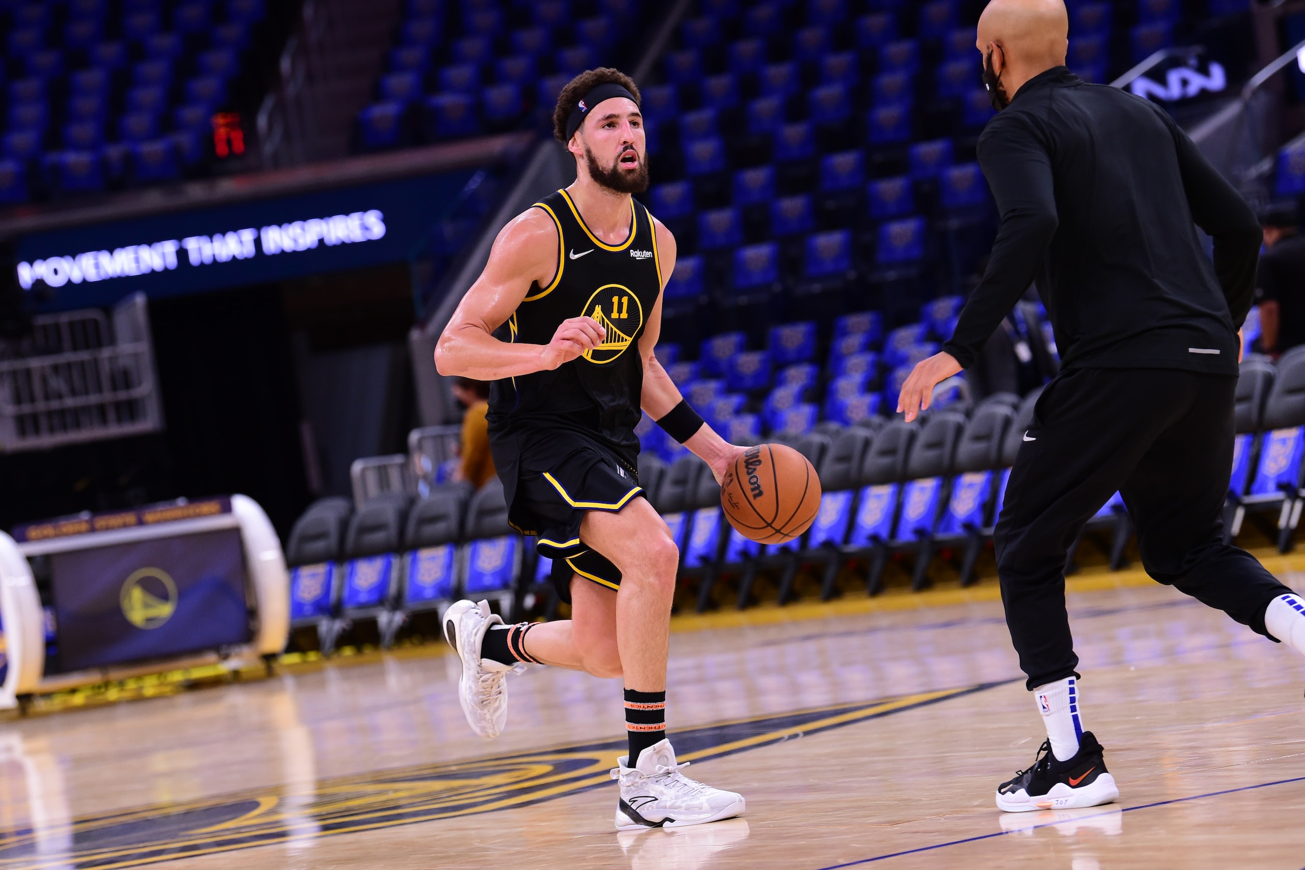 SAN FRANCISCO, CA - NOVEMBER 3: Klay Thompson #11 of the Golden State Warriors warms up prior to the game against the Charlotte Hornets on November 3, 2021 at Chase Center in San Francisco, California. NOTE TO USER: User expressly acknowledges and agrees that, by downloading and or using this photograph, user is consenting to the terms and conditions of Getty Images License Agreement. Mandatory Copyright Notice: Copyright 2021 NBAE (Photo by Noah Graham/NBAE via Getty Images)