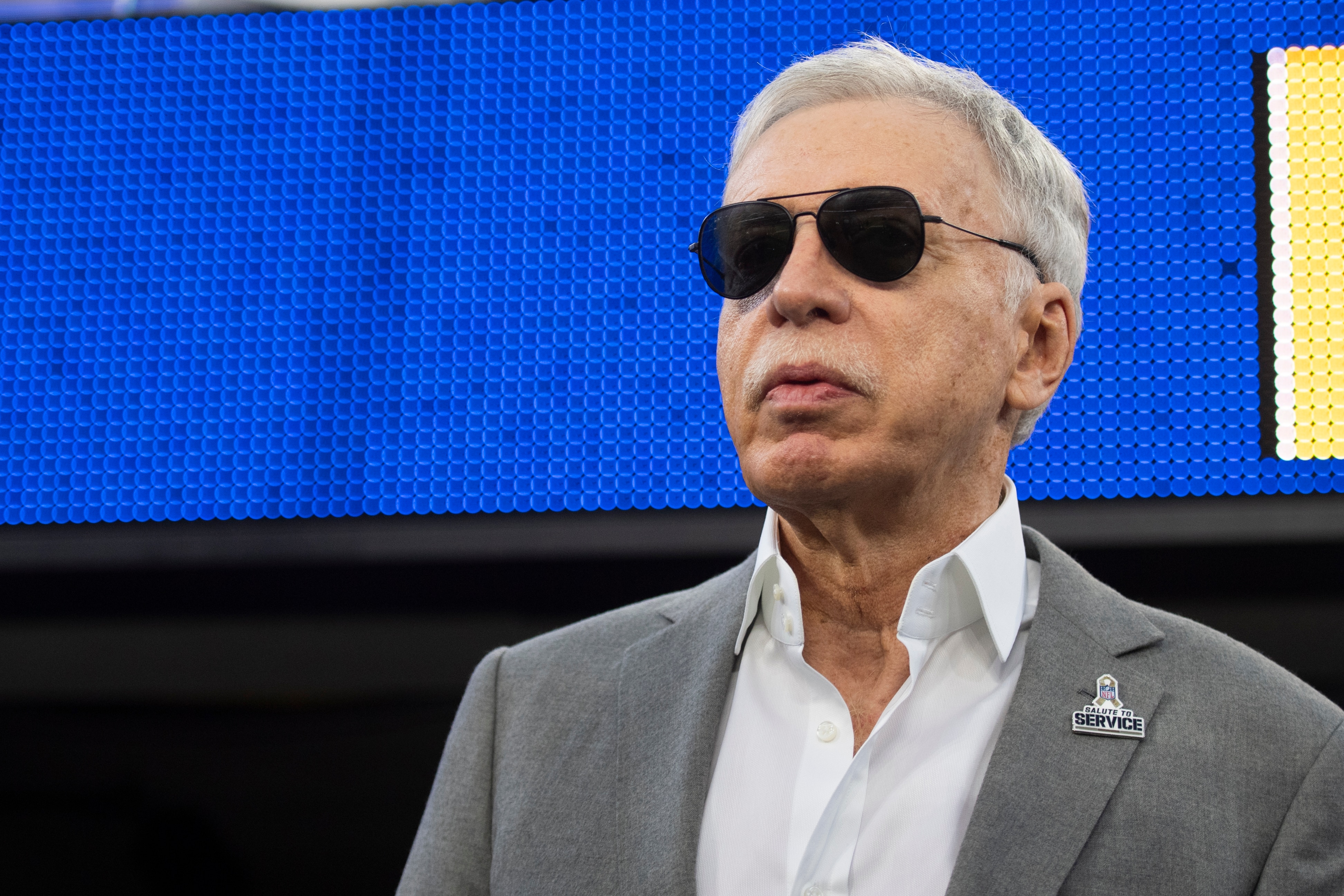 Los Angeles Rams owner Stan Kroenke walks on the field during an NFL football game against the Tennessee Titans Sunday, Nov. 7, 2021, in Inglewood, Calif. (AP Photo/Kyusung Gong)