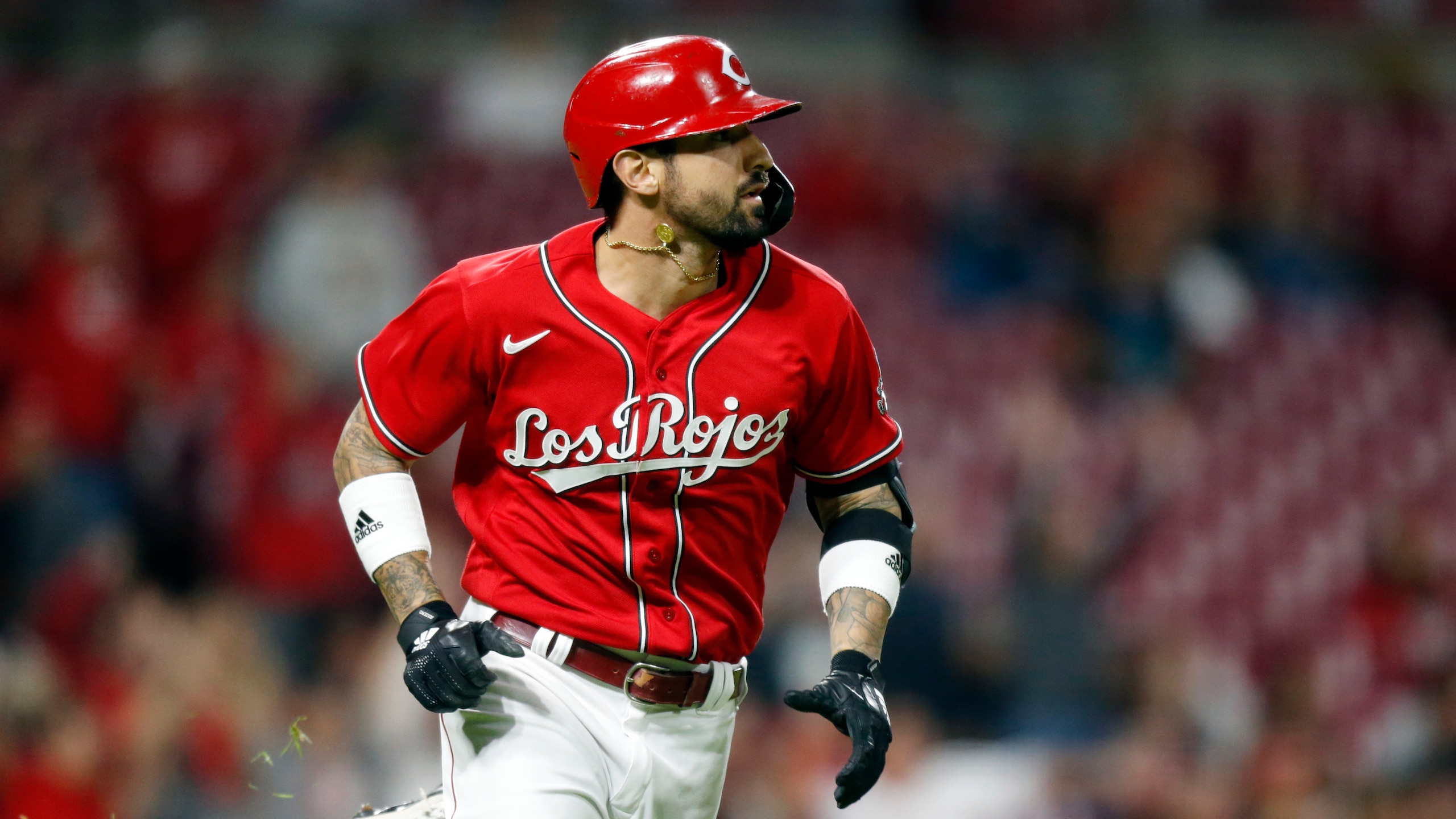 Cincinnati Reds' Nick Castellanos is seen after hitting a homerun during a baseball game against the Washington Nationals in Cincinnati Friday, Sept. 24, 2021. (AP Photo/Paul Vernon)
