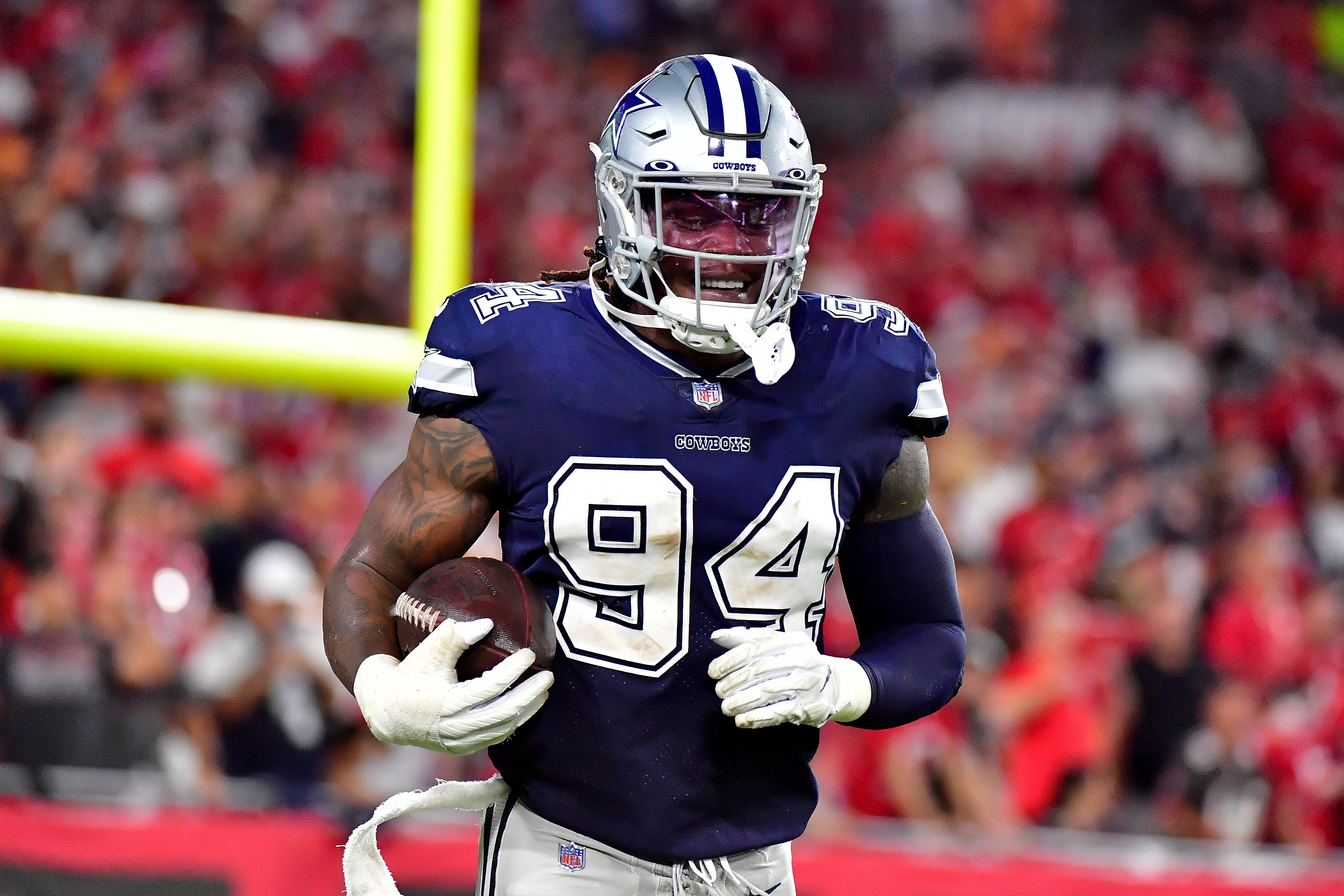 TAMPA, FLORIDA - SEPTEMBER 09: Randy Gregory #94 of the Dallas Cowboys reacts after a turnover against the Tampa Bay Buccaneers during the second quarter at Raymond James Stadium on September 09, 2021 in Tampa, Florida. (Photo by Julio Aguilar/Getty Images) TAMPA, FLORIDA - SEPTEMBER 09: Randy Gregory #94 of the Dallas Cowboys reacts after a turnover against the Tampa Bay Buccaneers during the second quarter at Raymond James Stadium on September 09, 2021 in Tampa, Florida. (Photo by Julio Aguilar/Getty Images)