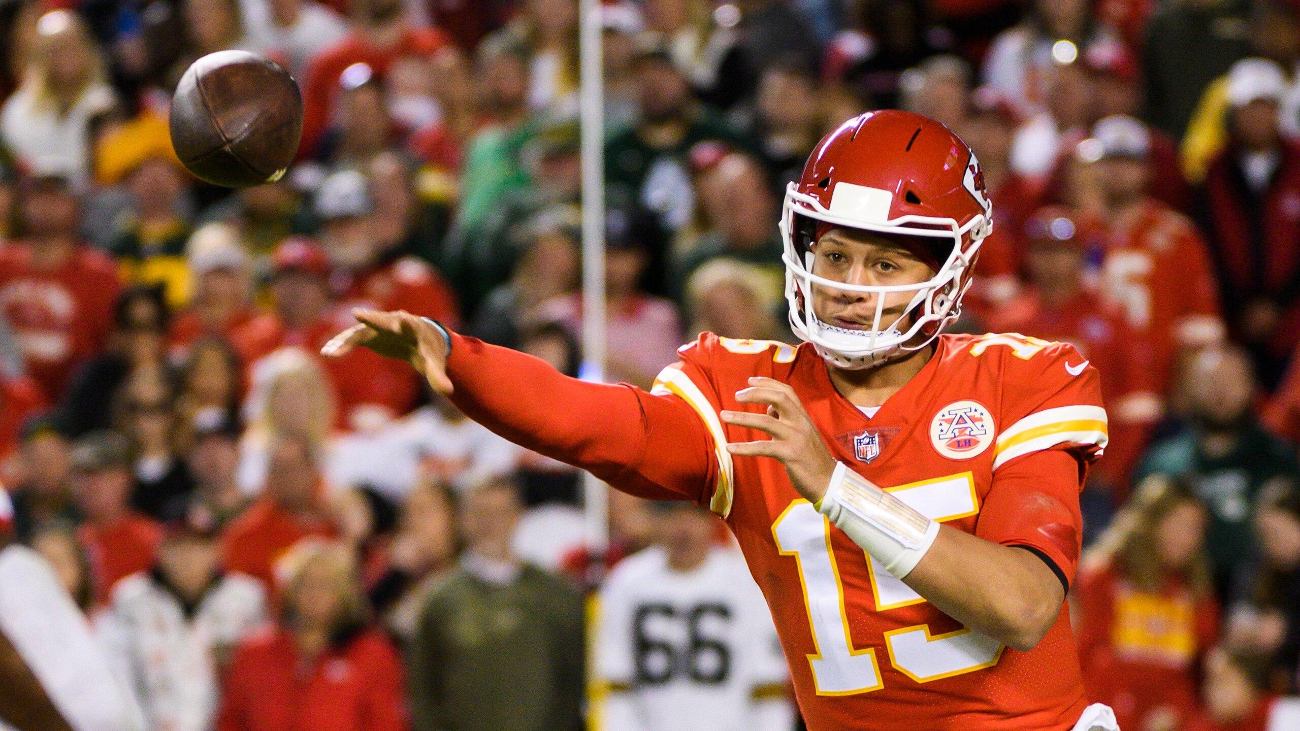 Kansas City Chiefs quarterback Patrick Mahomes throws against the Green Bay Packers during the second half of an NFL football game, Sunday, Nov. 7, 2021 in Kansas City, Mo. (AP Photo/Reed Hoffmann)