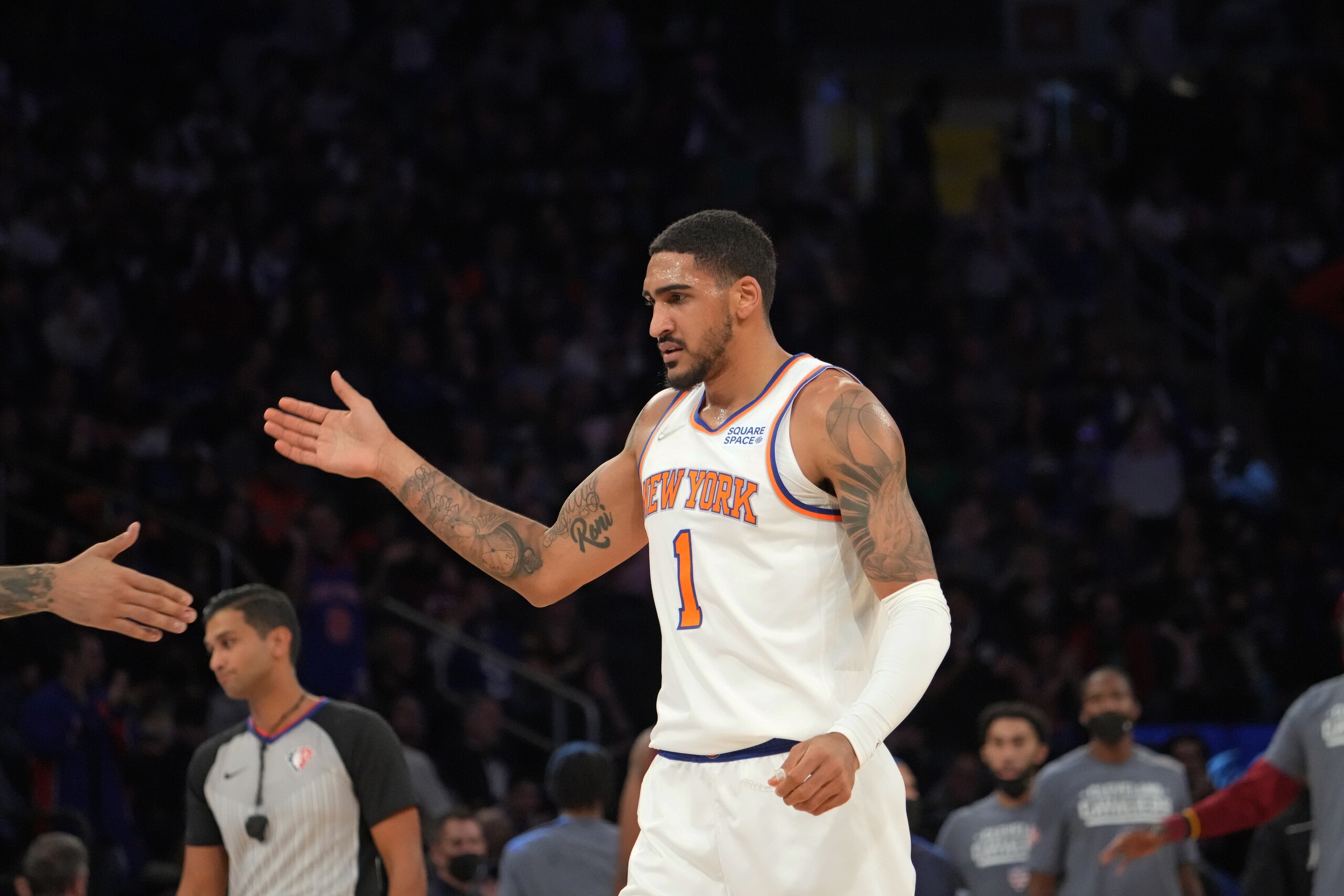 NEW YORK, NY - NOVEMBER 7: Obi Toppin #1 of the New York Knicks high-fives teammates during a game against the Cleveland Cavaliers on November 7, 2021 at Madison Square Garden in New York, New York. NOTE TO USER: User expressly acknowledges and agrees that, by downloading and/or using this Photograph, user is consenting to the terms and conditions of the Getty Images License Agreement. Mandatory Copyright Notice: Copyright 2021 NBAE (Photo by Jesse D. Garrabrant/NBAE via Getty Images)