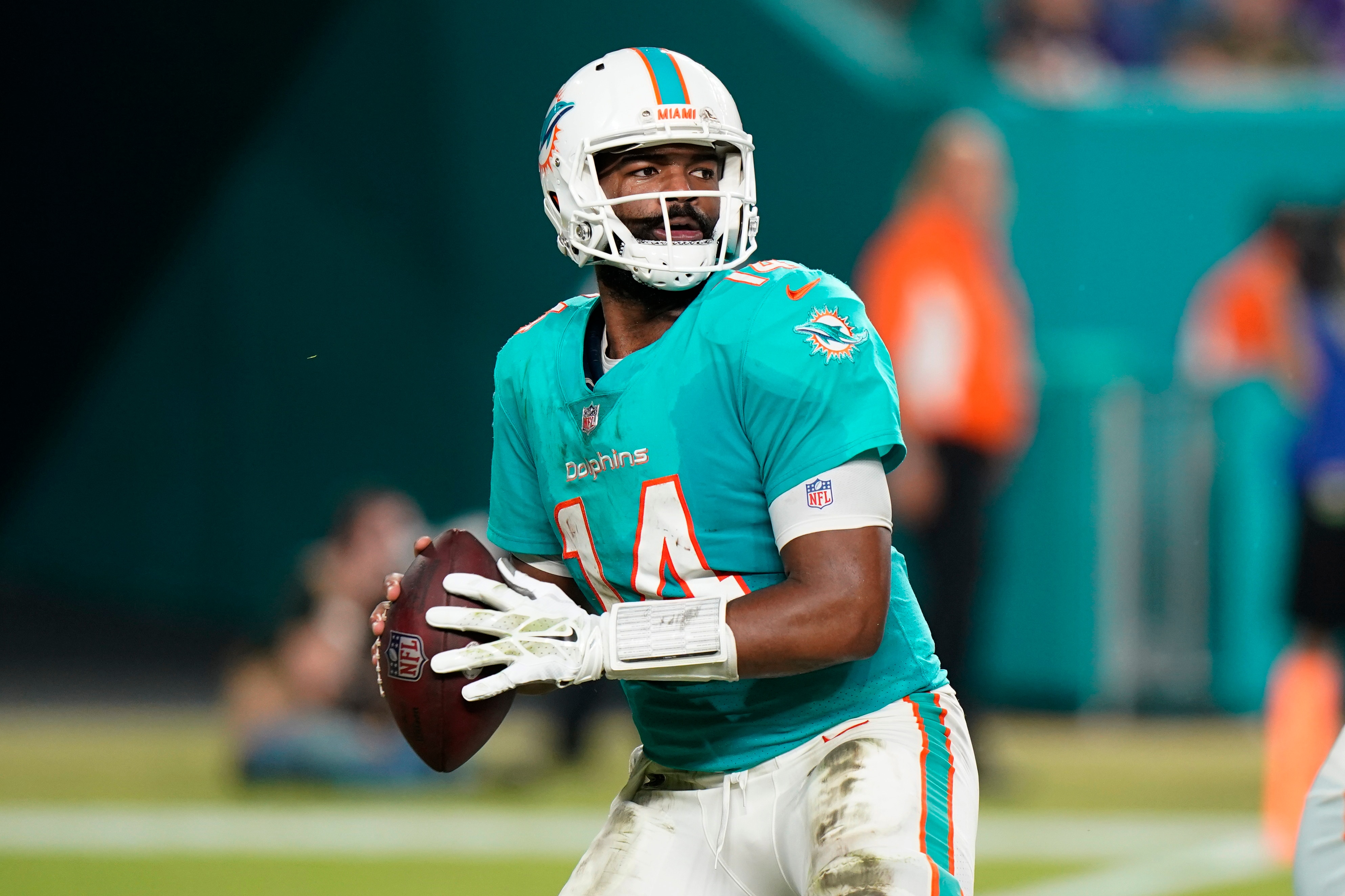 Miami Dolphins quarterback Jacoby Brissett (14) aims a pass during the first half of an NFL football game against the Baltimore Ravens, Thursday, Nov. 11, 2021, in Miami Gardens, Fla. (AP Photo/Wilfredo Lee)