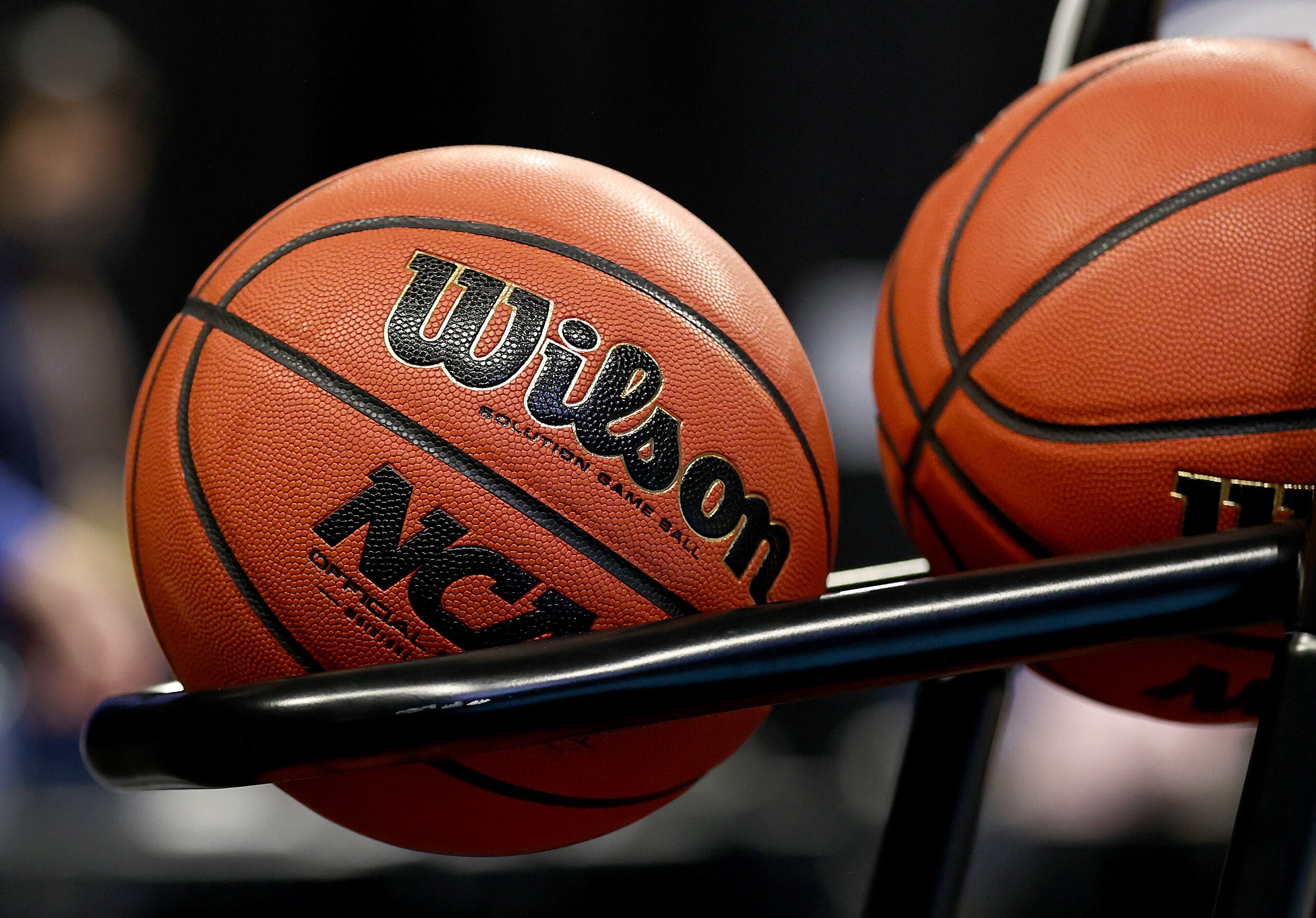SAN ANTONIO, TEXAS - MARCH 28: Basketballs are seen on the rack as they await warm ups to begin during the Sweet Sixteen round of the NCAA Women's Basketball Tournament at the Alamodome on March 28, 2021 in San Antonio, Texas. (Photo by Elsa/Getty Images)
