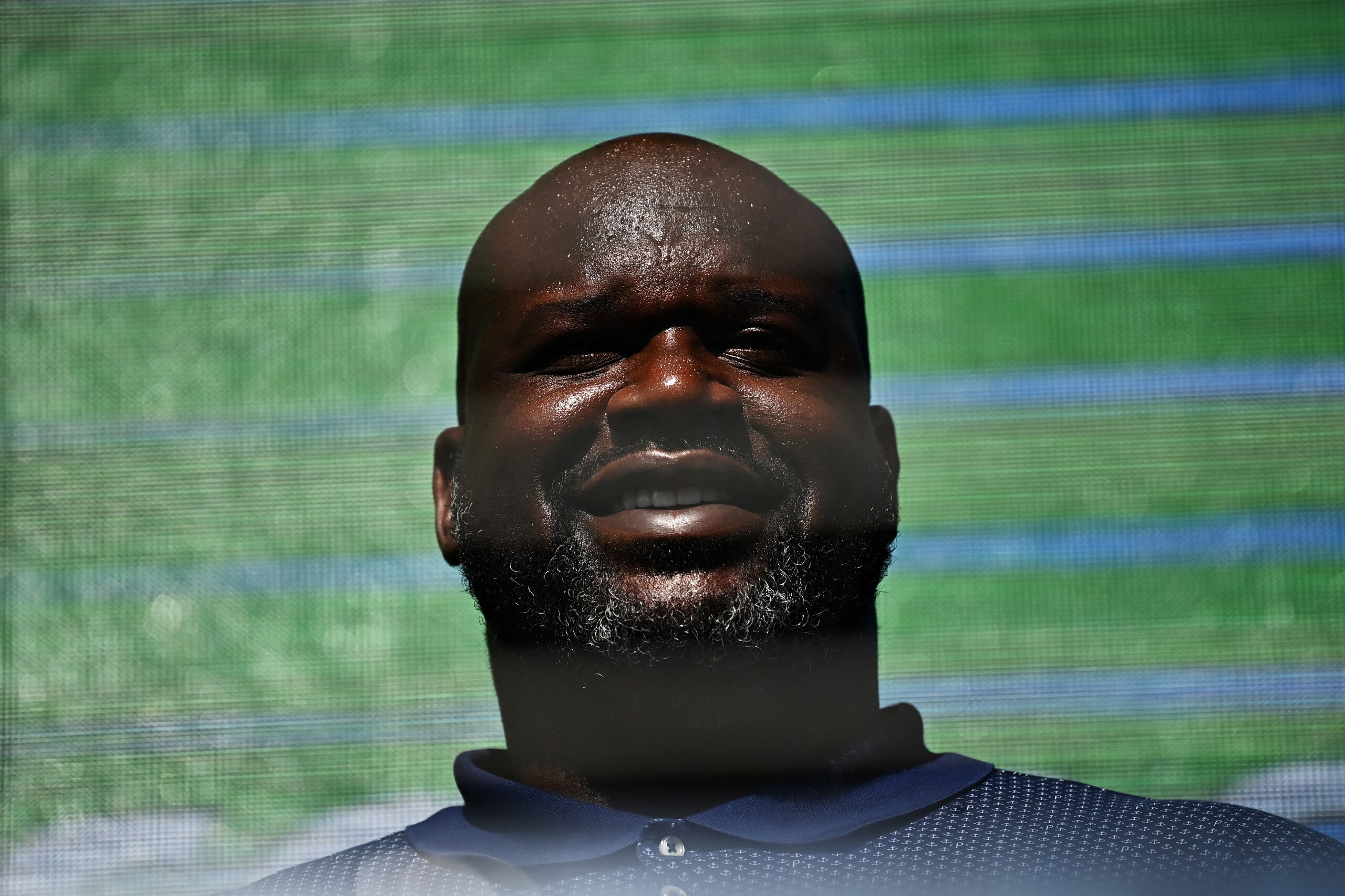 AUSTIN, TEXAS - OCTOBER 24: NBA legend Shaquille O'Neal looks on from the podium during the F1 Grand Prix of USA at Circuit of The Americas on October 24, 2021 in Austin, Texas. (Photo by Clive Mason - Formula 1/Formula 1 via Getty Images)