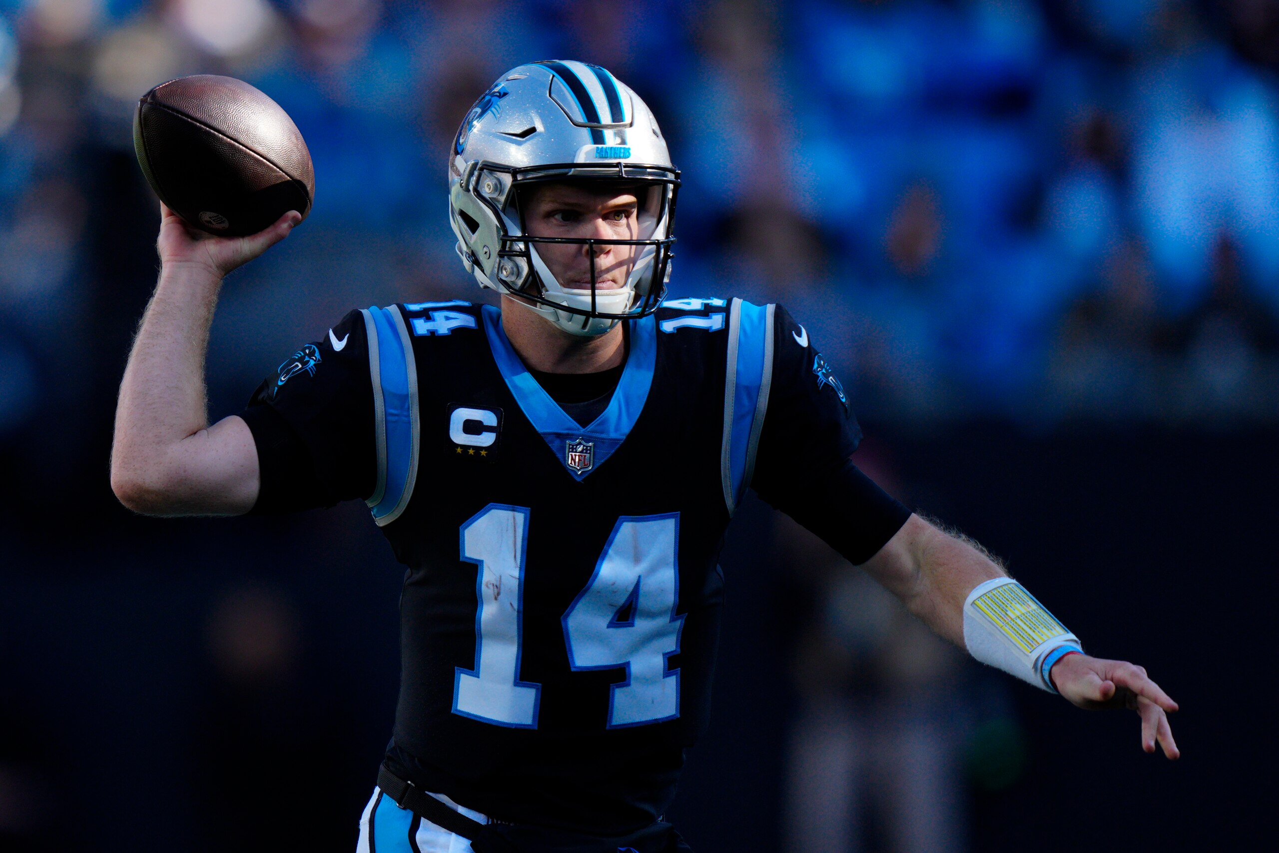 Carolina Panthers quarterback Sam Darnold throws an interception against the New England Patriots during the second half of an NFL football game Sunday, Nov. 7, 2021, in Charlotte, N.C. (AP Photo/Jacob Kupferman)