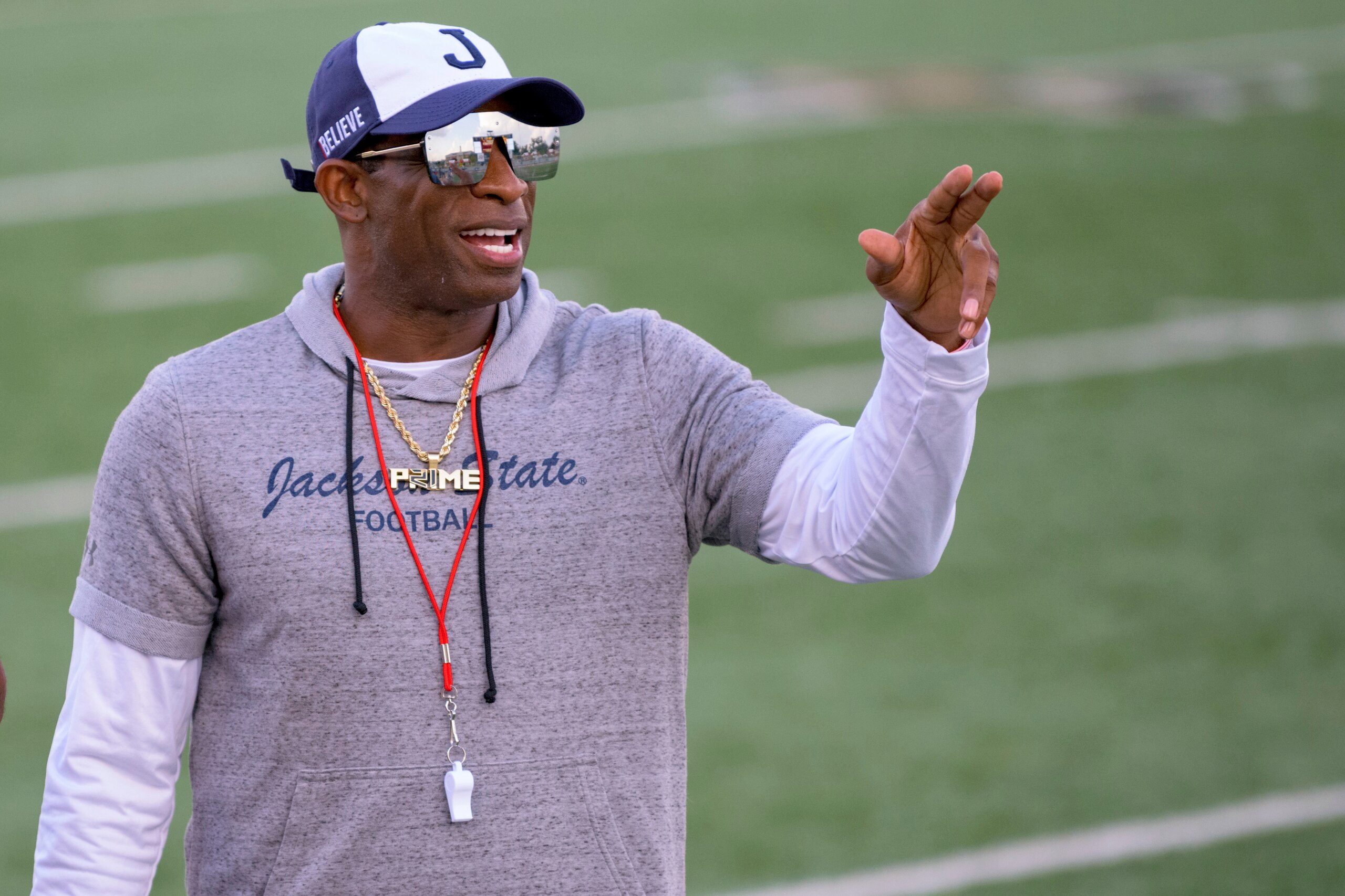 Jackson State head coach Deion Sanders points during an NCAA football game against Louisiana Monroe on Saturday, Sept. 18, 2021, in Monroe, La. (AP Photo/Matthew Hinton)