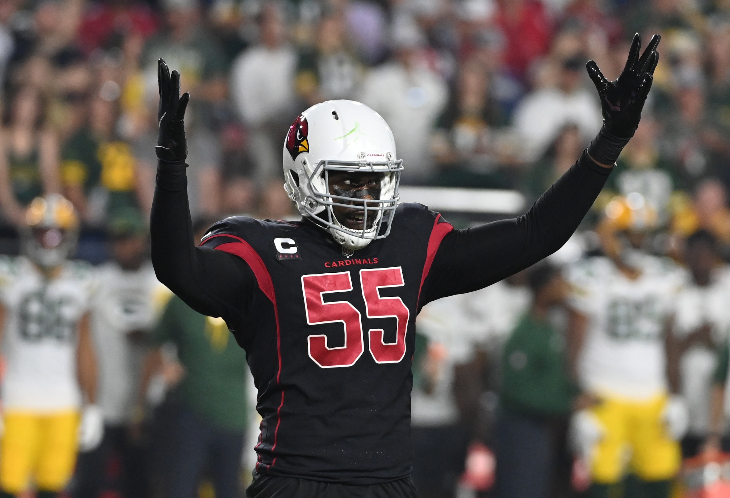 GLENDALE, ARIZONA - OCTOBER 28: Chandler Jones #55 of the Arizona Cardinals pumps up the crowd against the Green Bay Packers at State Farm Stadium on October 28, 2021 in Glendale, Arizona. Green Bay won 24-21. (Photo by Norm Hall/Getty Images)