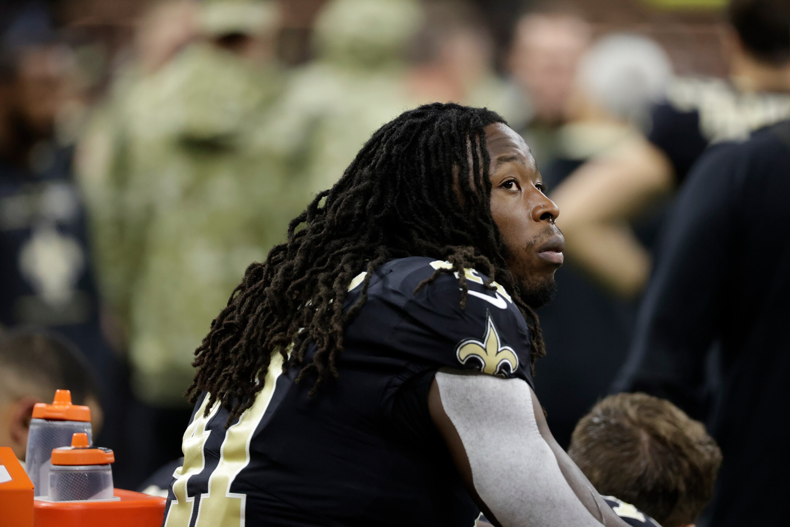New Orleans Saints running back Alvin Kamara (41) sits the bench during the first half of an NFL football game against the Atlanta Falcons, Sunday, Nov. 7, 2021, in New Orleans. (AP Photo/Derick Hingle)