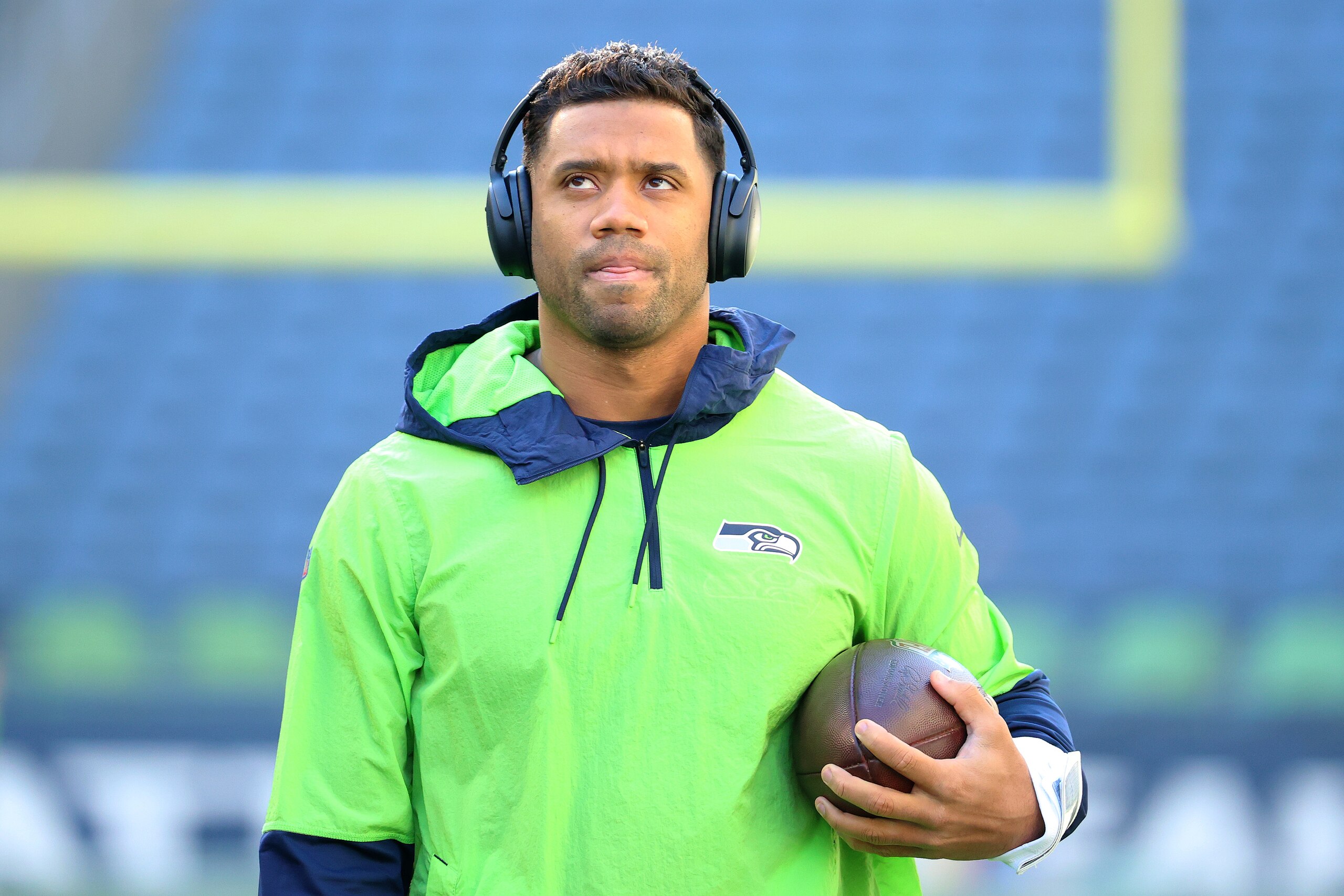 SEATTLE, WASHINGTON - OCTOBER 31: Russell Wilson #3 of the Seattle Seahawks warms up before the game against the Jacksonville Jaguars at Lumen Field on October 31, 2021 in Seattle, Washington. (Photo by Abbie Parr/Getty Images)