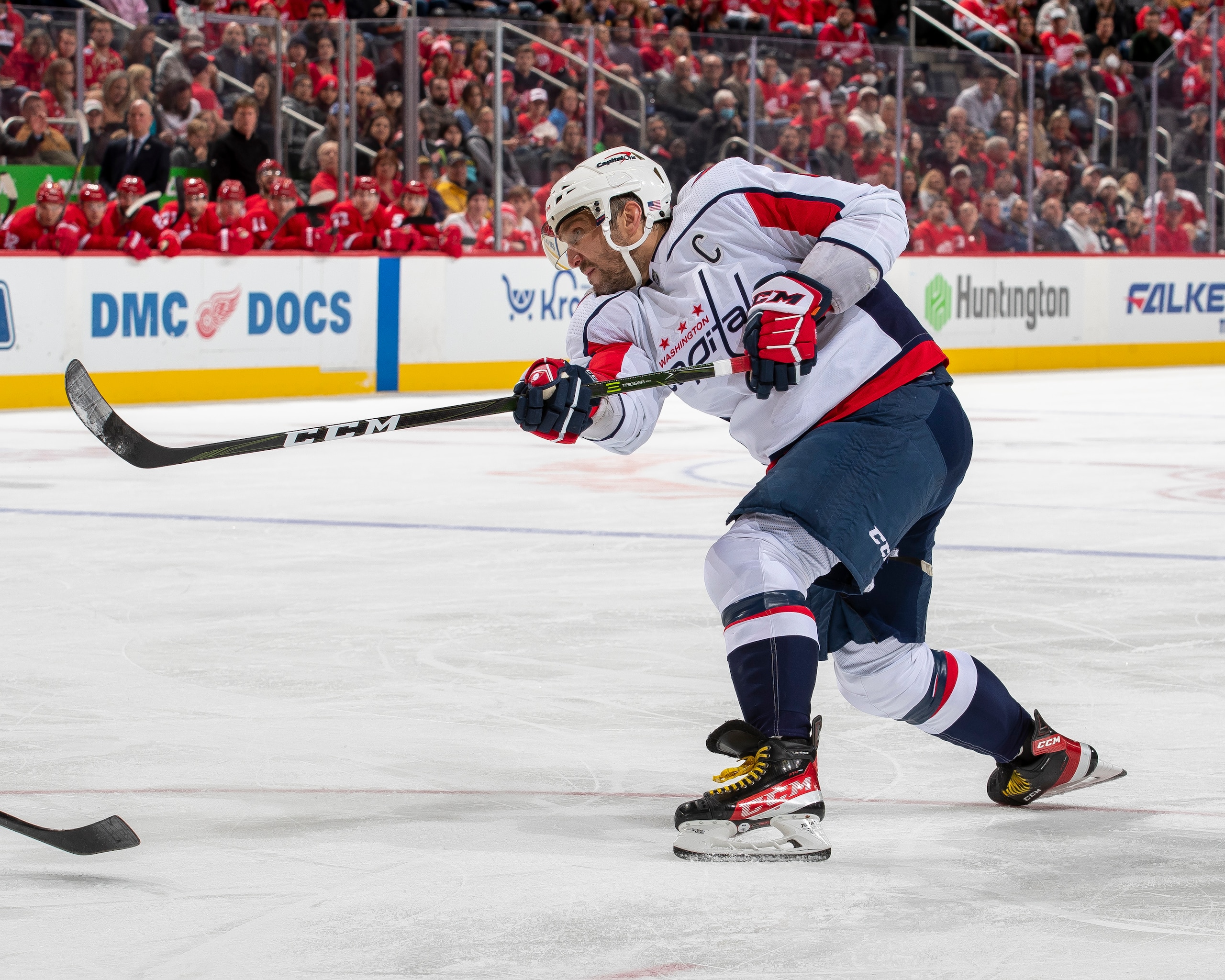 DETROIT, MI - NOVEMBER 11: Alex Ovechkin #8 of the Washington Capitals shoots the puck against the Detroit Red Wings during the second period of an NHL game at Little Caesars Arena on November 11, 2021 in Detroit, Michigan. (Photo by Dave Reginek/NHLI via Getty Images)
