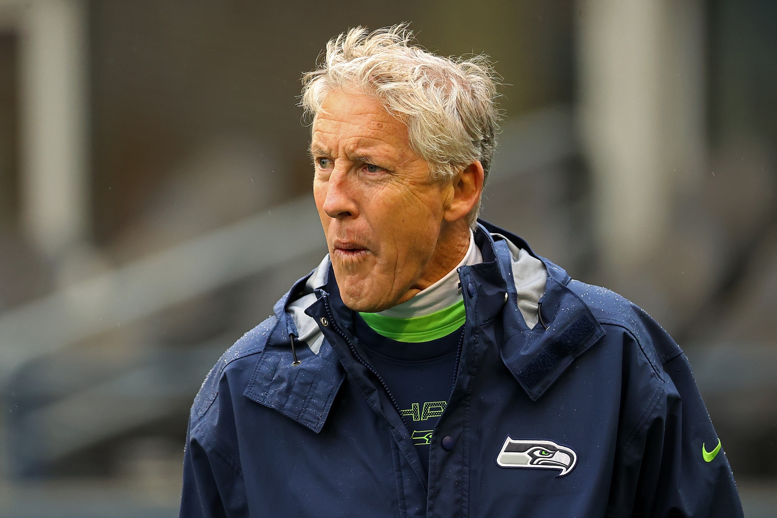SEATTLE, WASHINGTON - OCTOBER 25:  Head coach Pete Carroll of the Seattle Seahawks watches action prior to a game  at Lumen Field on October 25, 2021 in Seattle, Washington. (Photo by Abbie Parr/Getty Images)