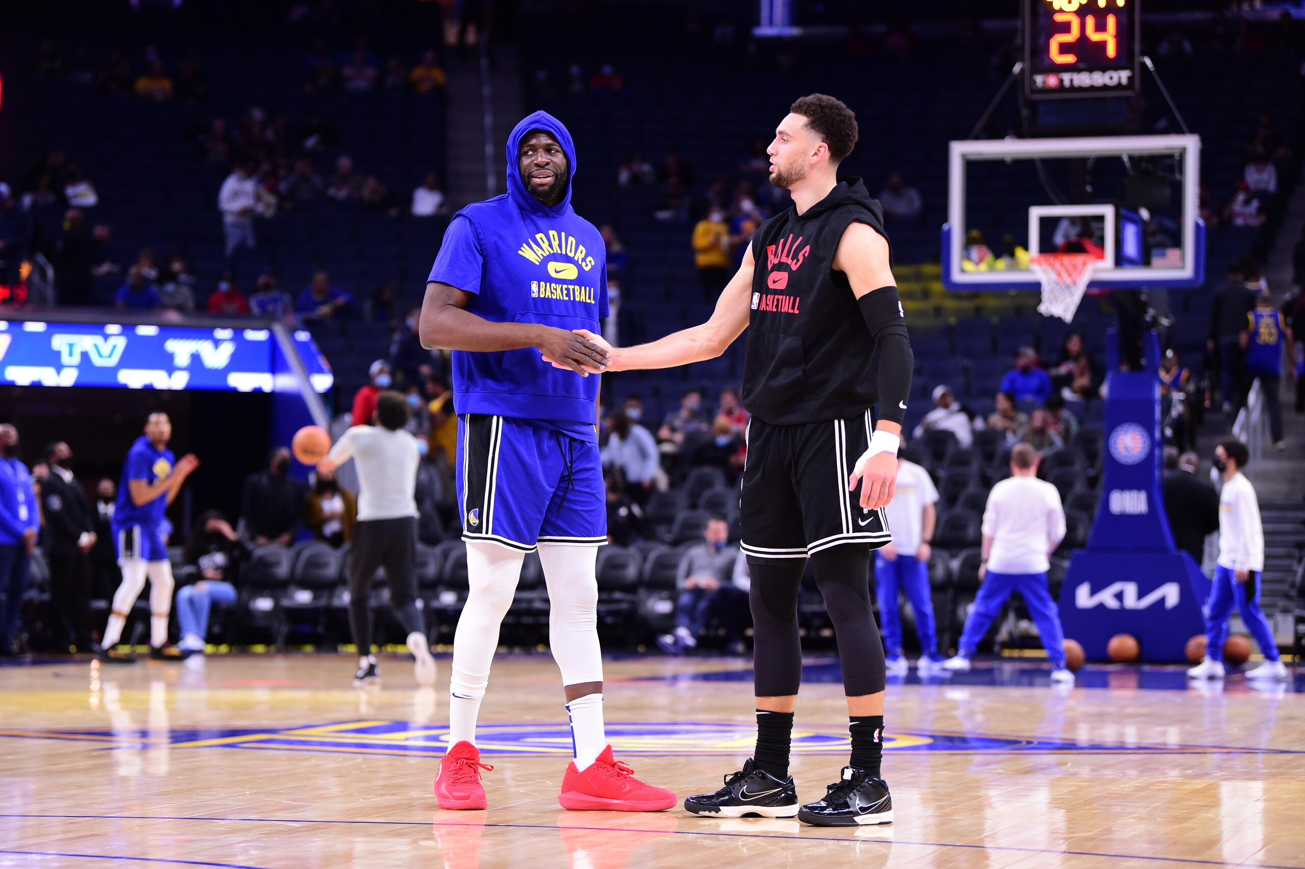 SAN FRANCISCO, CA - NOVEMBER 12: Draymond Green #23 of the Golden State Warriors and Zach LaVine #8 of the Chicago Bulls hi-five prior to the game on November 12, 2021 at Chase Center in San Francisco, California. NOTE TO USER: User expressly acknowledges and agrees that, by downloading and or using this photograph, user is consenting to the terms and conditions of Getty Images License Agreement. Mandatory Copyright Notice: Copyright 2021 NBAE (Photo by Noah Graham/NBAE via Getty Images)