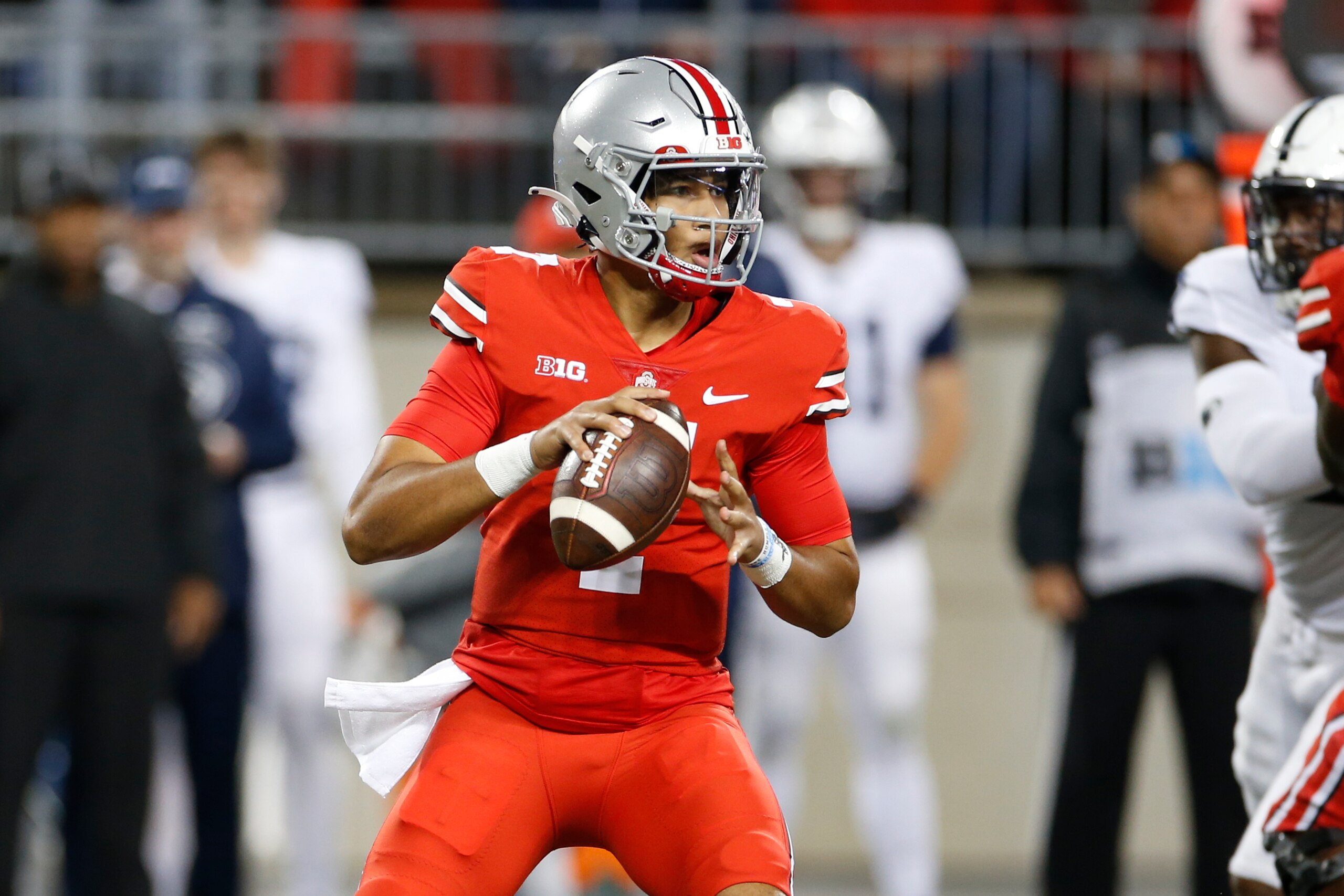 Ohio State quarterback C.J. Stroud looks for a a receiver during the first half of the team's NCAA college football game against Penn State on Saturday, Oct. 30, 2021, in Columbus, Ohio. (AP Photo/Jay LaPrete)