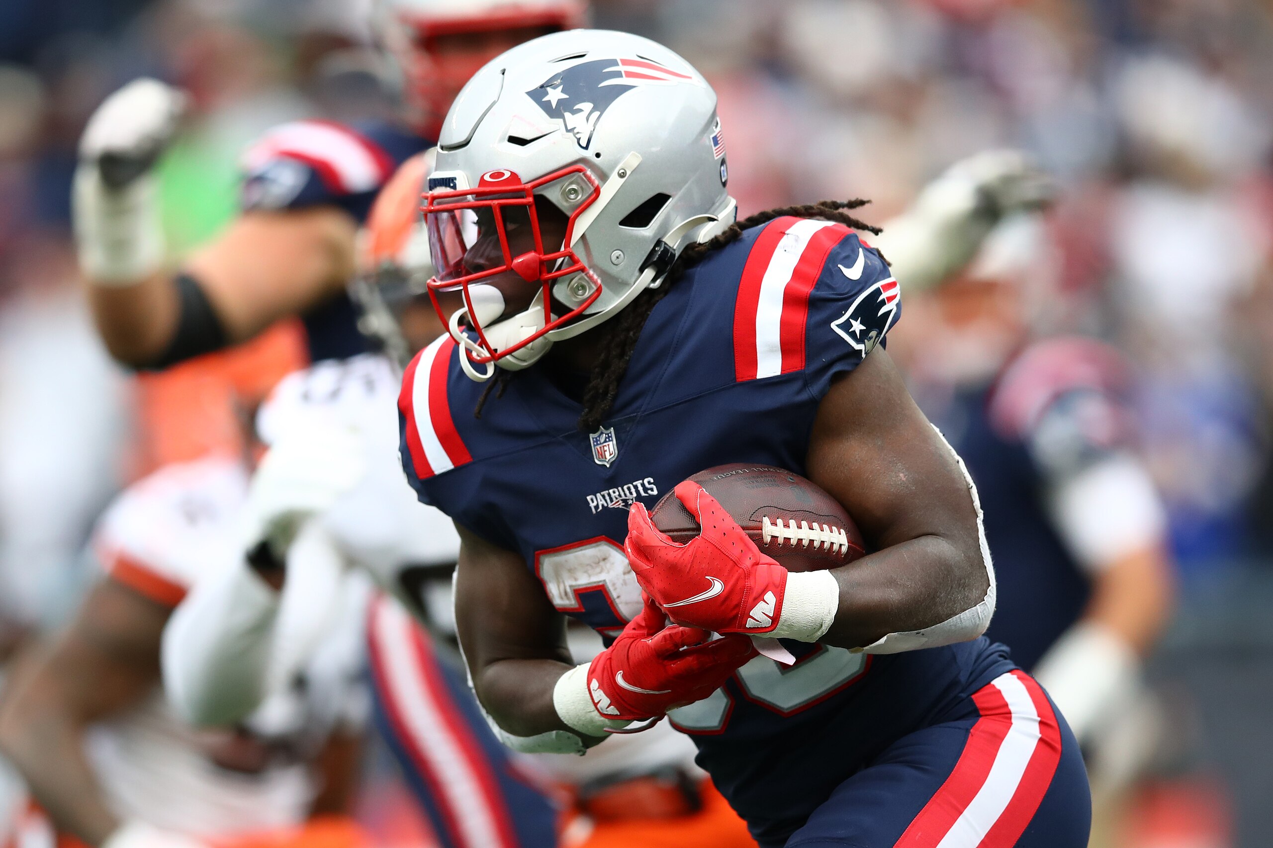FOXBOROUGH, MASSACHUSETTS - NOVEMBER 14: Rhamondre Stevenson #38 of the New England Patriots runs with the ball against the Cleveland Browns during the second quarter  at Gillette Stadium on November 14, 2021 in Foxborough, Massachusetts. (Photo by Adam Glanzman/Getty Images)