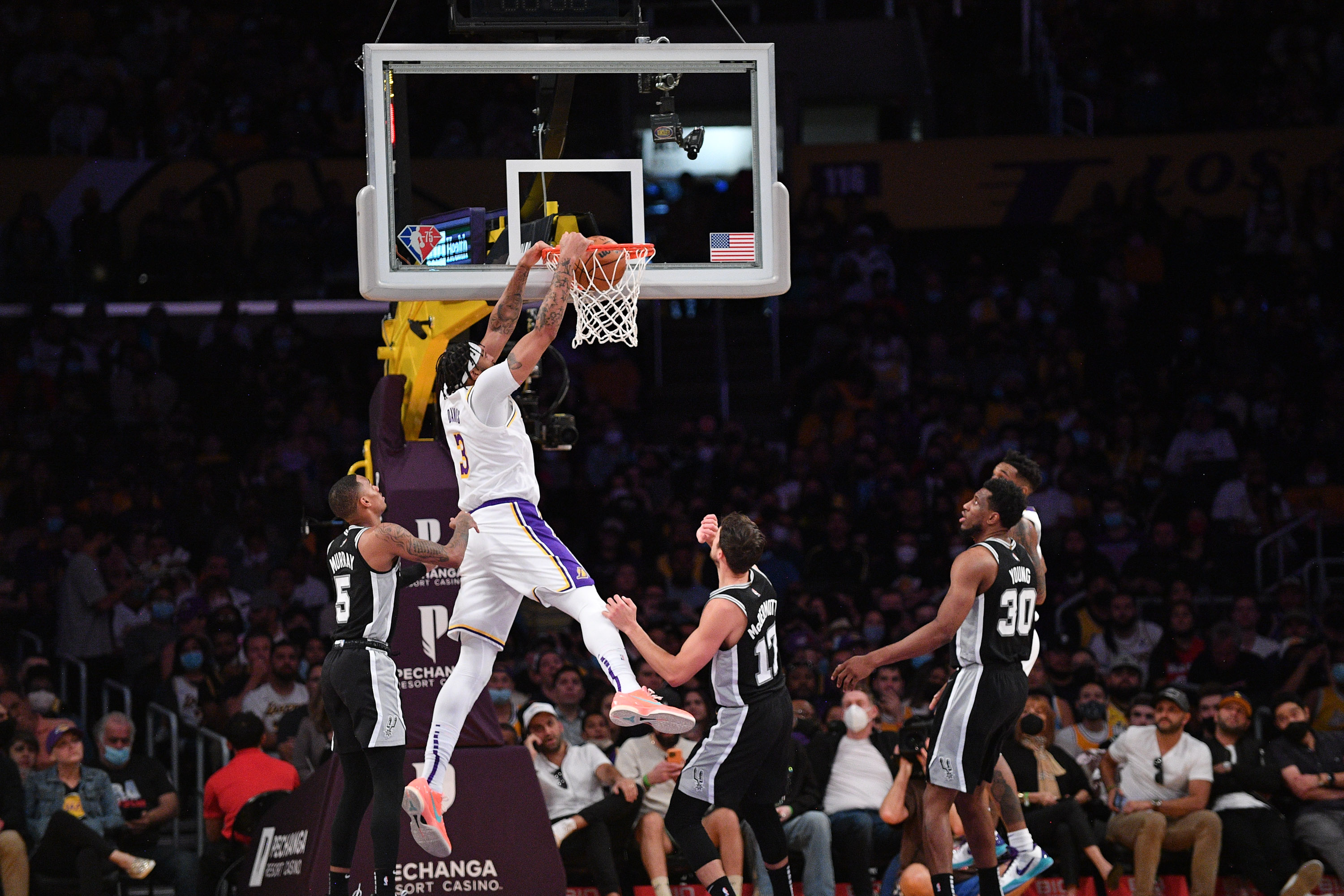 LOS ANGELES, CALIFORNIA - NOVEMBER 14: Anthony Davis #3 of the Los Angeles Lakers dunks the ball during the first half of a game against the San Antonio Spurs at Staples Center on November 14, 2021 in Los Angeles, California. NOTE TO USER: User expressly acknowledges and agrees that, by downloading and/or using this Photograph, user is consenting to the terms and conditions of the Getty Images License Agreement. (Photo by Allen Berezovsky/Getty Images)