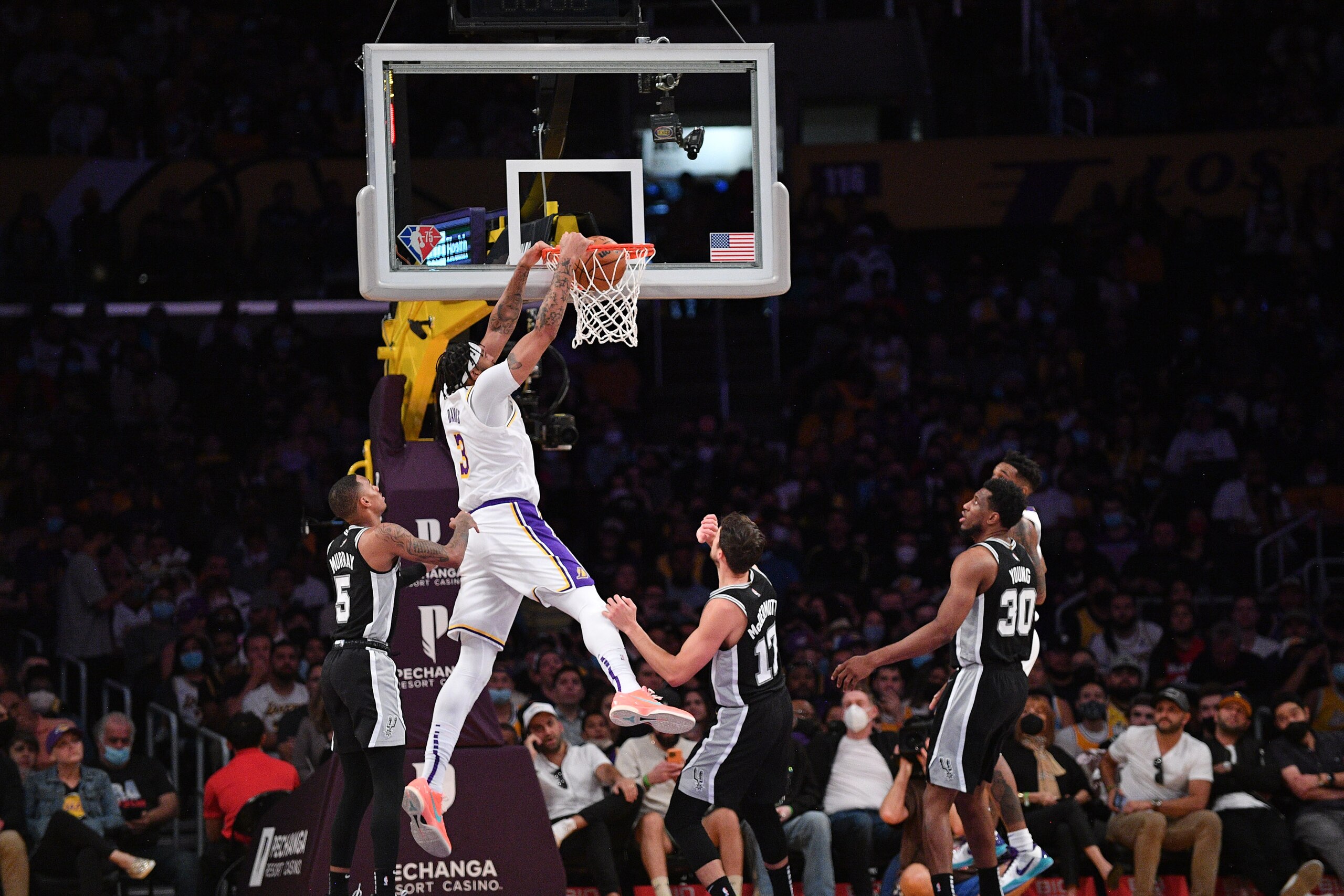 LOS ANGELES, CALIFORNIA - NOVEMBER 14: Anthony Davis #3 of the Los Angeles Lakers dunks the ball during the first half of a game against the San Antonio Spurs at Staples Center on November 14, 2021 in Los Angeles, California. NOTE TO USER: User expressly acknowledges and agrees that, by downloading and/or using this Photograph, user is consenting to the terms and conditions of the Getty Images License Agreement. (Photo by Allen Berezovsky/Getty Images)
