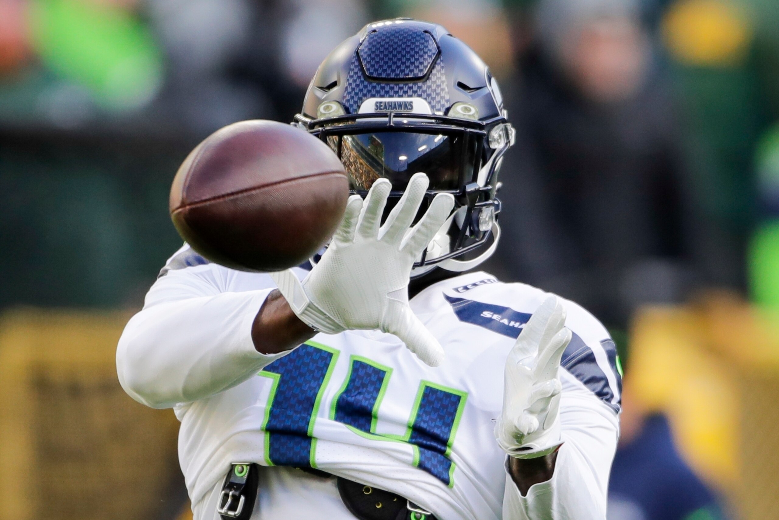 Seattle Seahawks' DK Metcalf warms up before an NFL football game against the Green Bay Packers Sunday, Nov. 14, 2021, in Green Bay, Wis. (AP Photo/Aaron Gash)