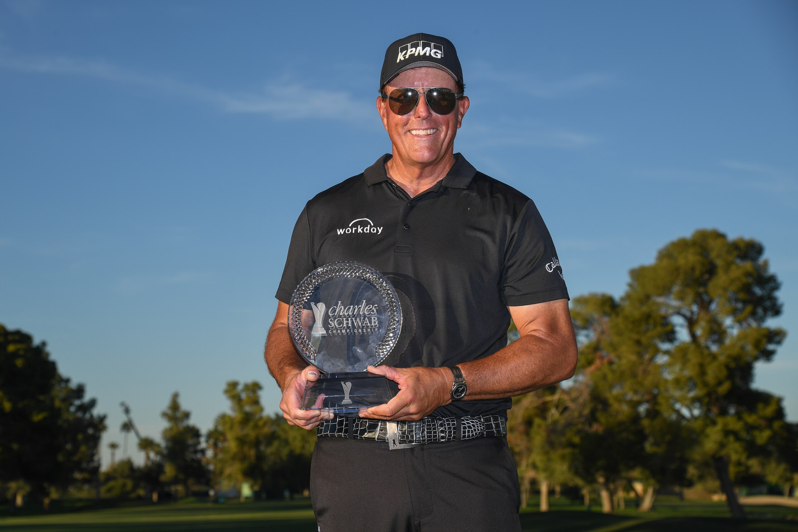 PHOENIX, AZ - NOVEMBER 14: Phil Mickelson holds the tournament trophy on the 18th green after the final round of the PGA TOUR Champions Charles Schwab Cup Championship at Phoenix Country Club on November 14, 2021 in Phoenix, Arizona. (Photo by Ben Jared/PGA TOUR via Getty Images)