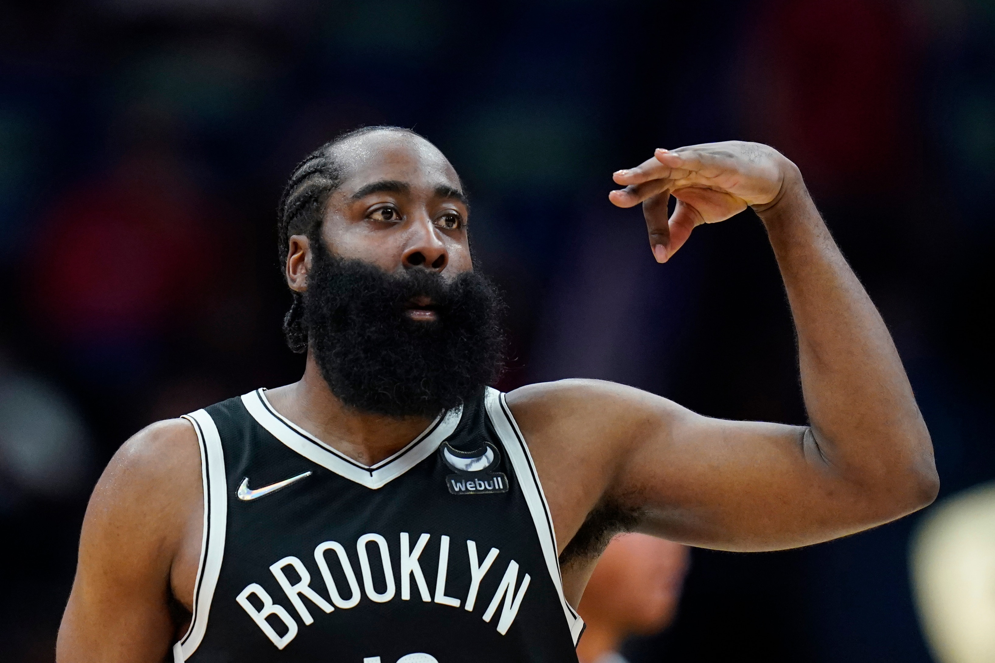 Brooklyn Nets guard James Harden (13) reacts after making a 3-point basket in the second half of an NBA basketball game against the New Orleans Pelicans in New Orleans, Friday, Nov. 12, 2021. The Nets won 120-112. (AP Photo/Gerald Herbert)