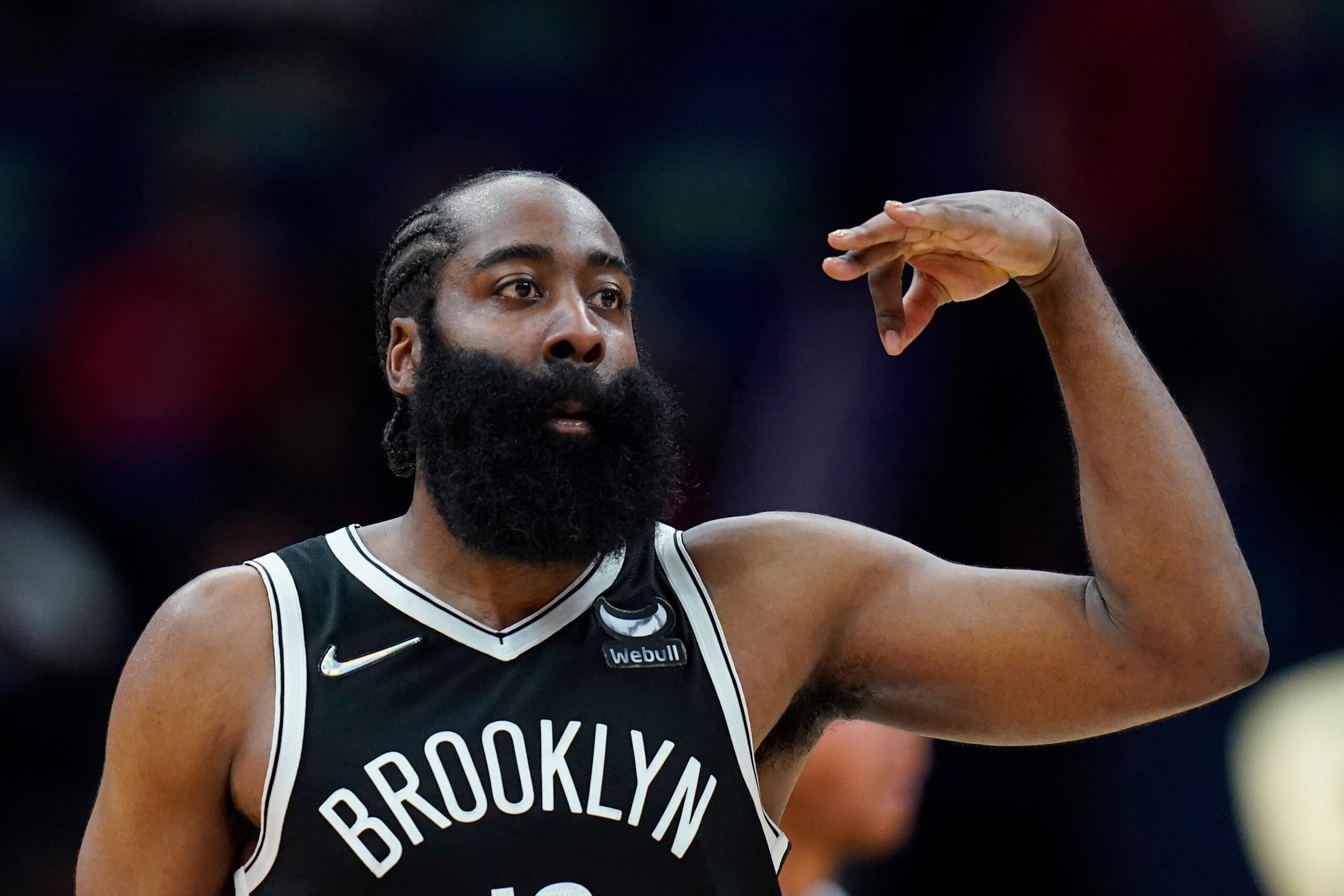 Brooklyn Nets guard James Harden (13) reacts after making a 3-point basket in the second half of an NBA basketball game against the New Orleans Pelicans in New Orleans, Friday, Nov. 12, 2021. The Nets won 120-112. (AP Photo/Gerald Herbert)