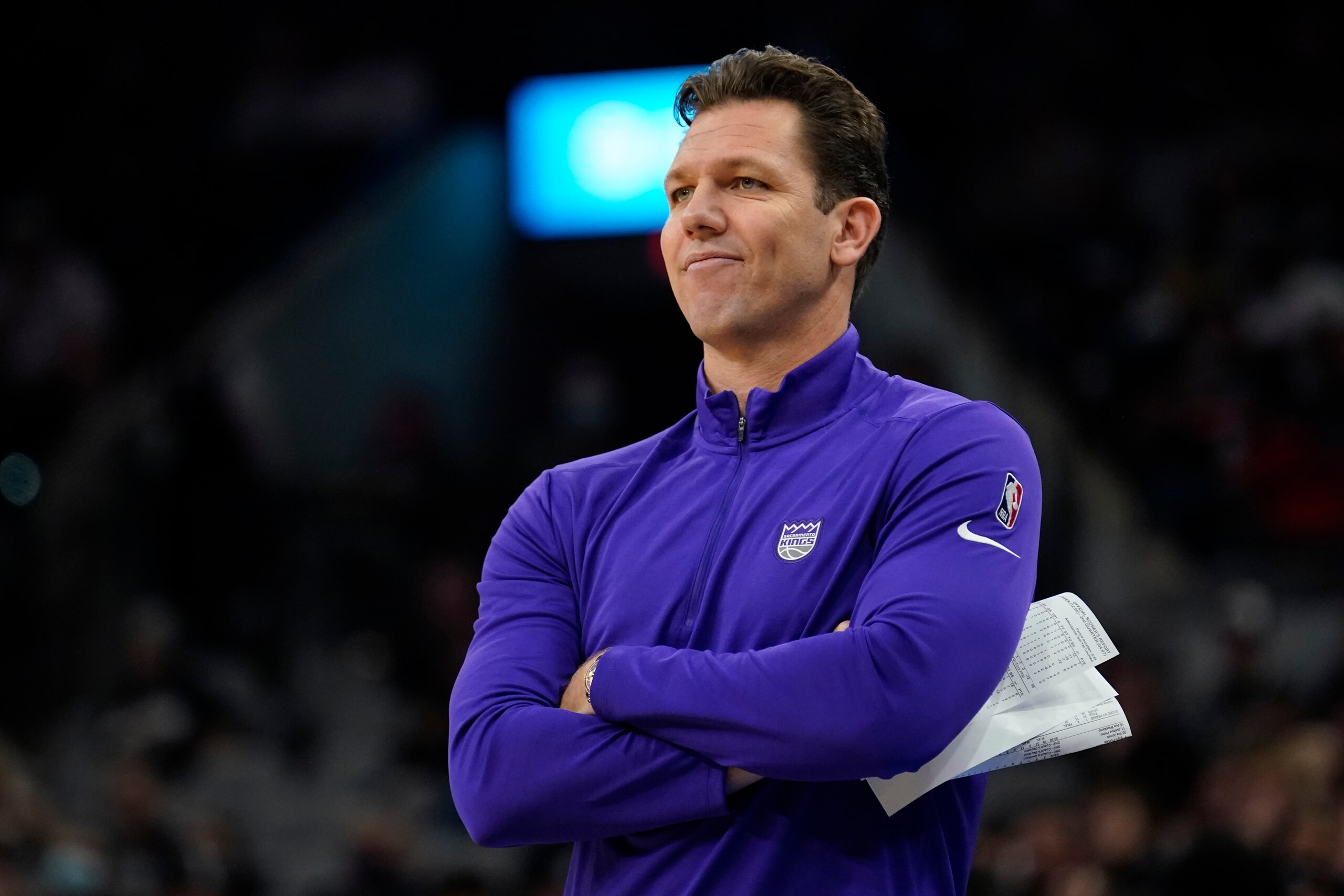 Sacramento Kings coach Luke Walton watches during the first half of the team's NBA basketball game against the San Antonio Spurs, Wednesday, Nov. 10, 2021, in San Antonio. (AP Photo/Eric Gay)