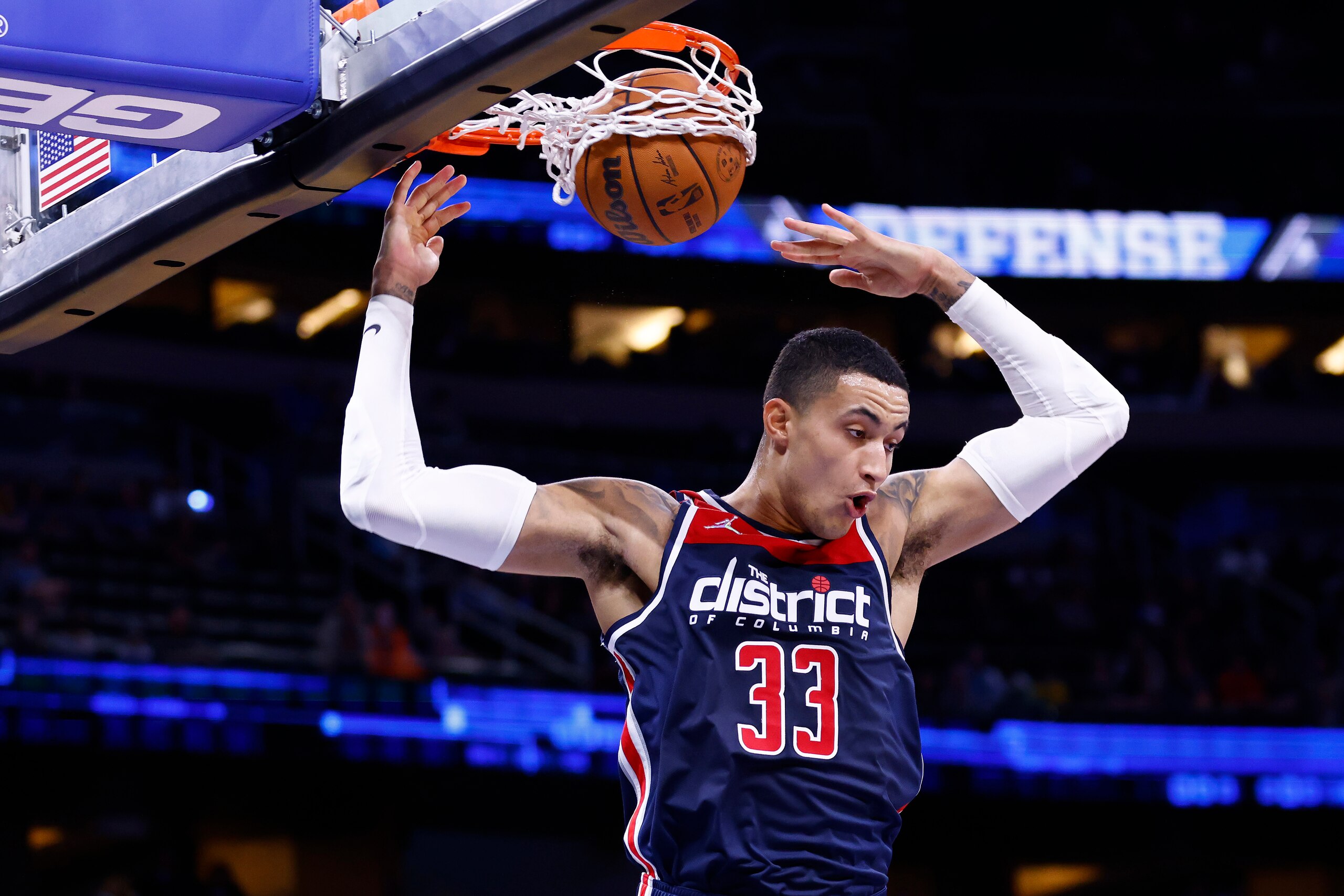 ORLANDO, FLORIDA - NOVEMBER 13: Kyle Kuzma #33 of the Washington Wizards dunks against the Orlando Magic during the first half at Amway Center on November 13, 2021 in Orlando, Florida. NOTE TO USER: User expressly acknowledges and agrees that, by downloading and or using this photograph, User is consenting to the terms and conditions of the Getty Images License Agreement.  (Photo by Michael Reaves/Getty Images)