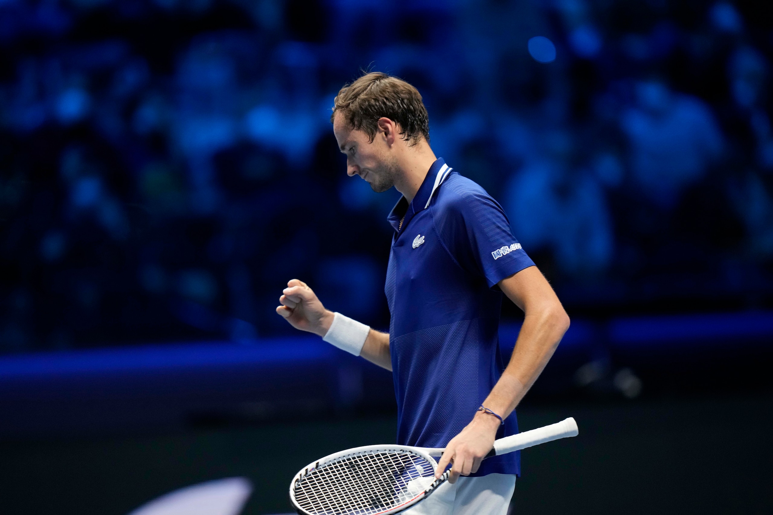 Russia's Daniil Medvedev celebrates after a winning point as he plays Germany's Alexander Zverev during their ATP World Tour Finals singles tennis match, at the Pala Alpitour in Turin, Tuesday, Nov. 16, 2021. (AP Photo/Luca Bruno)
