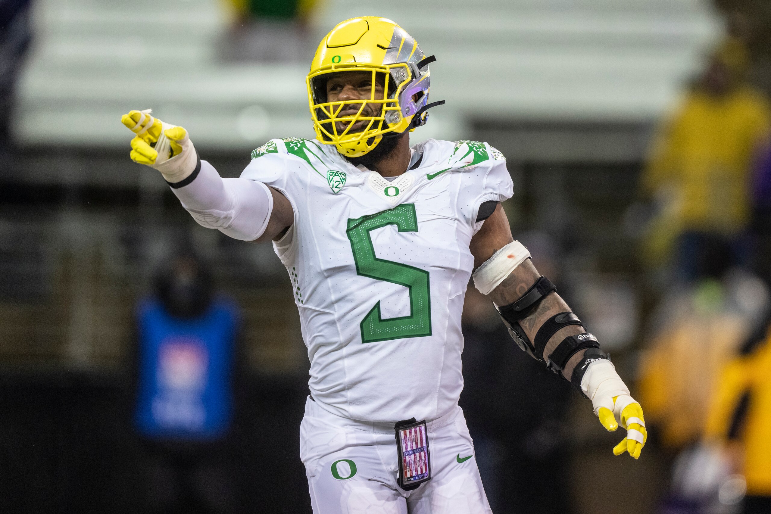 Oregon defensive end Kayvon Thibodeaux celebrates after his team scored a safety during the second half of an NCAA college football game against Washington, Saturday, Nov. 6, 2021, in Seattle. (AP Photo/Stephen Brashear)