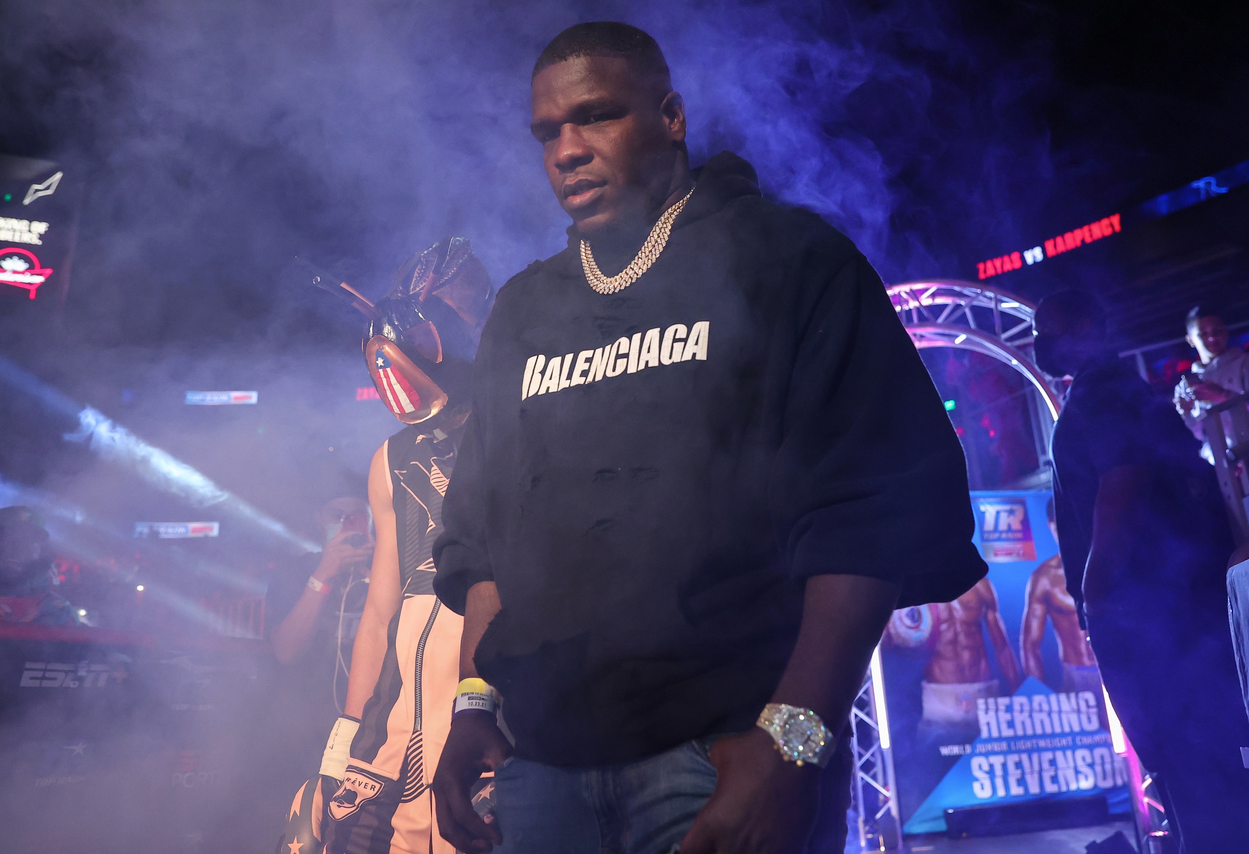 ATLANTA, GEORGIA - OCTOBER 23: Xander Zayas (L) and Frank Gore (R) walking to the ring before Xanders fight against Dan Karpency at State Farm Arena on October 23, 2021 in Atlanta, Georgia.(Photo by Mikey Williams/Top Rank Inc via Getty Images)