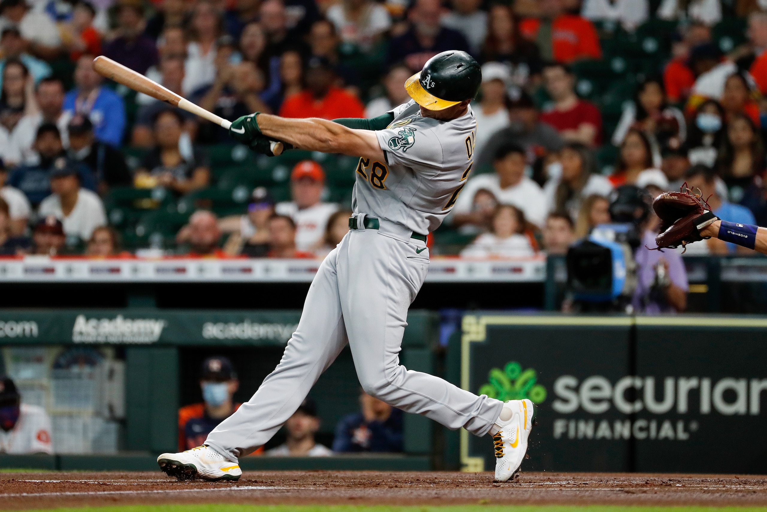 HOUSTON, TEXAS - OCTOBER 02: Matt Olson #28 of the Oakland Athletics bats in the first inning against the Houston Astros at Minute Maid Park on October 02, 2021 in Houston, Texas. (Photo by Tim Warner/Getty Images) HOUSTON, TEXAS - OCTOBER 02: Matt Olson #28 of the Oakland Athletics bats in the first inning against the Houston Astros at Minute Maid Park on October 02, 2021 in Houston, Texas. (Photo by Tim Warner/Getty Images)