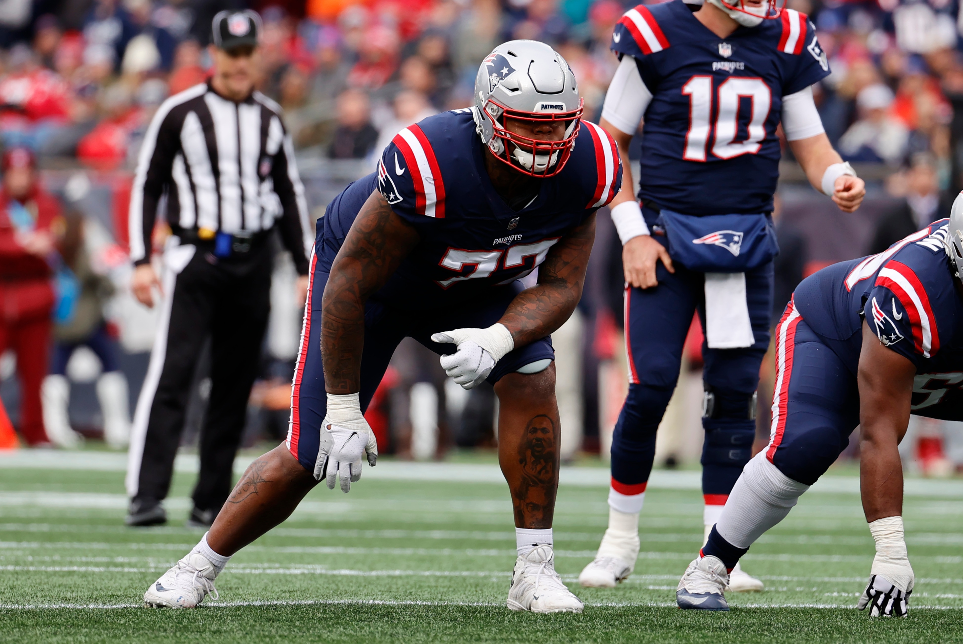 FOXBOROUGH, MA - NOVEMBER 14: New England Patriots offensive lineman Trent Brown (77) gets set for a play during a game between the New England Patriots and the Cleveland Browns on November 14, 2021, at Gillette Stadium in Foxborough, Massachusetts. (Photo by Fred Kfoury III/Icon Sportswire via Getty Images)