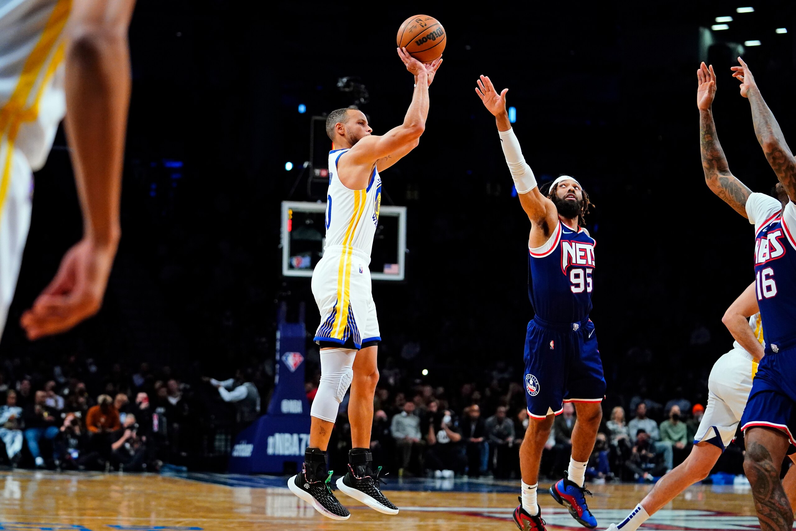 Golden State Warriors' Stephen Curry (30) shoots over Brooklyn Nets' DeAndre' Bembry (95) during the first half of an NBA basketball game Tuesday, Nov. 16, 2021 in New York. (AP Photo/Frank Franklin II) Golden State Warriors' Stephen Curry (30) shoots over Brooklyn Nets' DeAndre' Bembry (95) during the first half of an NBA basketball game Tuesday, Nov. 16, 2021 in New York. (AP Photo/Frank Franklin II)
