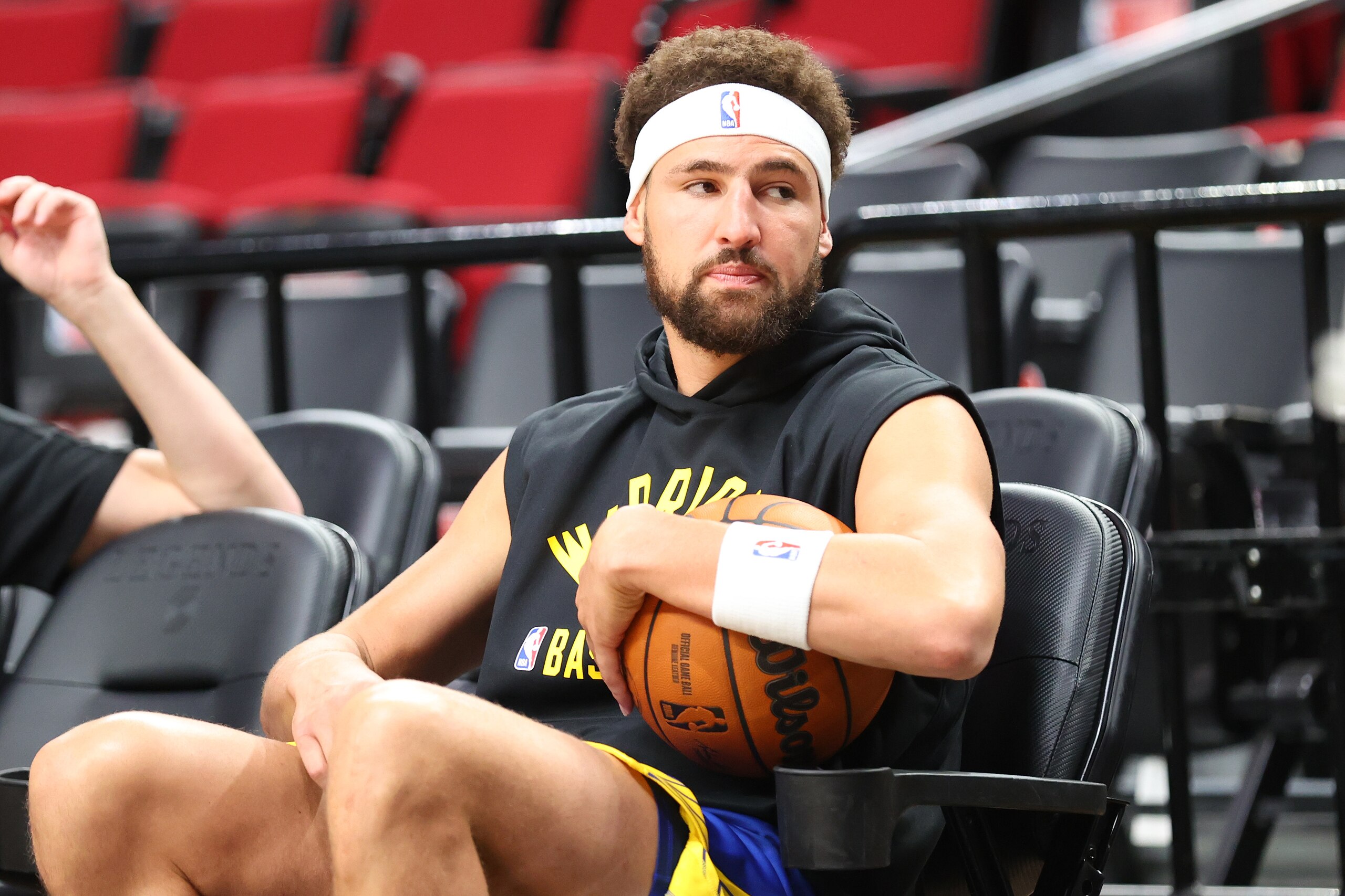 PORTLAND, OREGON - OCTOBER 04: Klay Thompson #11 of the Golden State Warriors looks on before the preseason game against the Portland Trail Blazers at Moda Center on October 04, 2021 in Portland, Oregon. NOTE TO USER: User expressly acknowledges and agrees that, by downloading and or using this photograph, User is consenting to the terms and conditions of the Getty Images License Agreement.  (Photo by Abbie Parr/Getty Images)