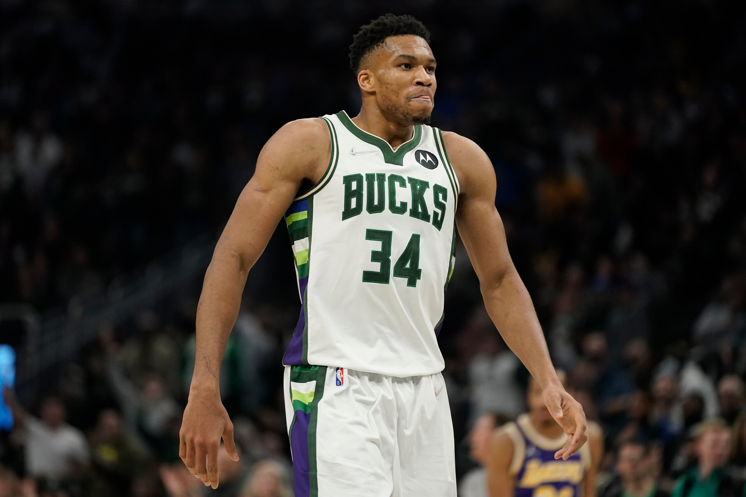 Milwaukee Bucks' Giannis Antetokounmpo reacts after scoring during the first half of an NBA basketball game against the Los Angeles Lakers Wednesday, Nov. 17, 2021, in Milwaukee. (AP Photo/Morry Gash)