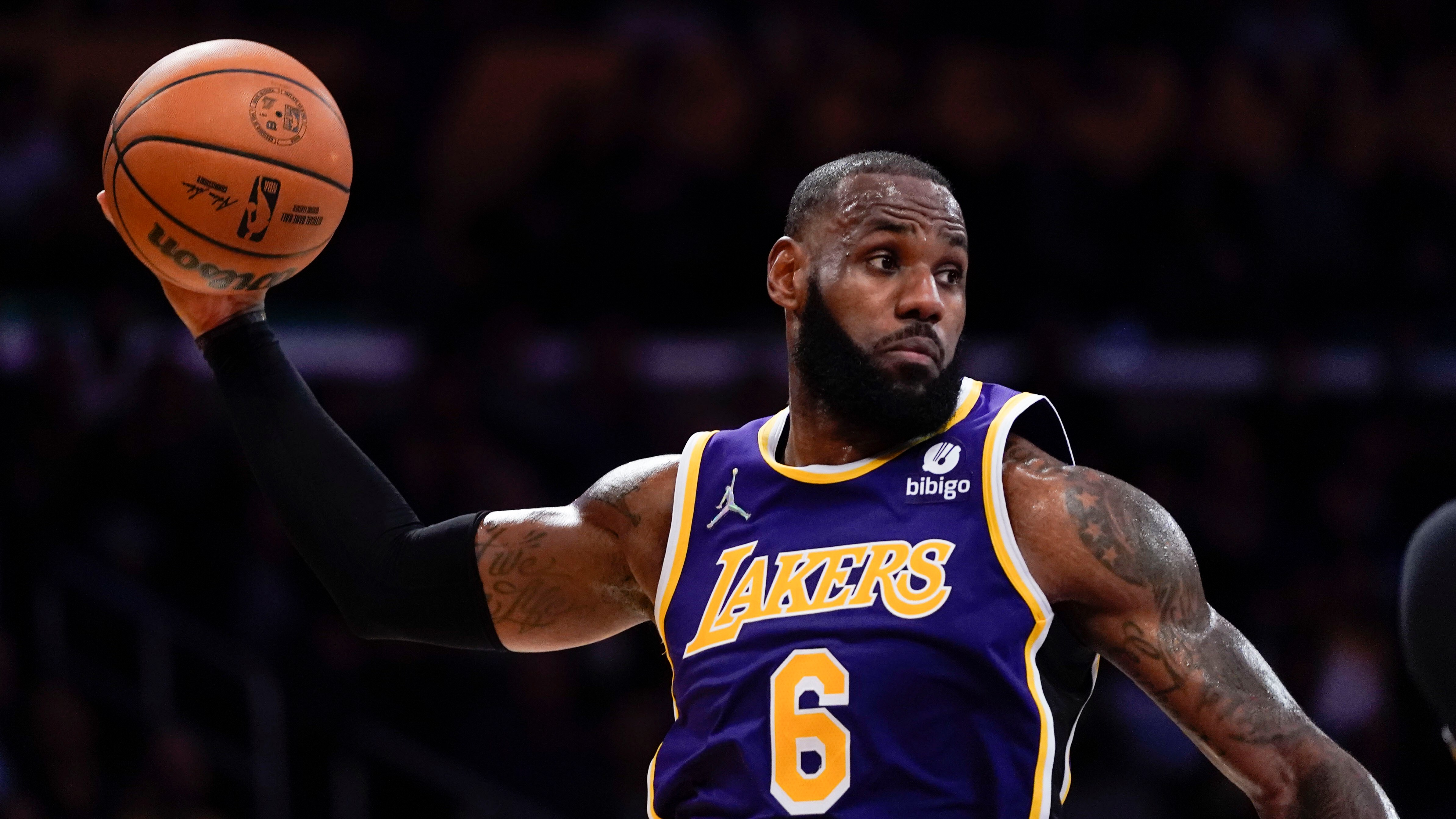 Los Angeles Lakers' LeBron James passes the ball during the second half of an NBA basketball game against the Cleveland Cavaliers Friday, Oct. 29, 2021, in Los Angeles. (AP Photo/Jae C. Hong)