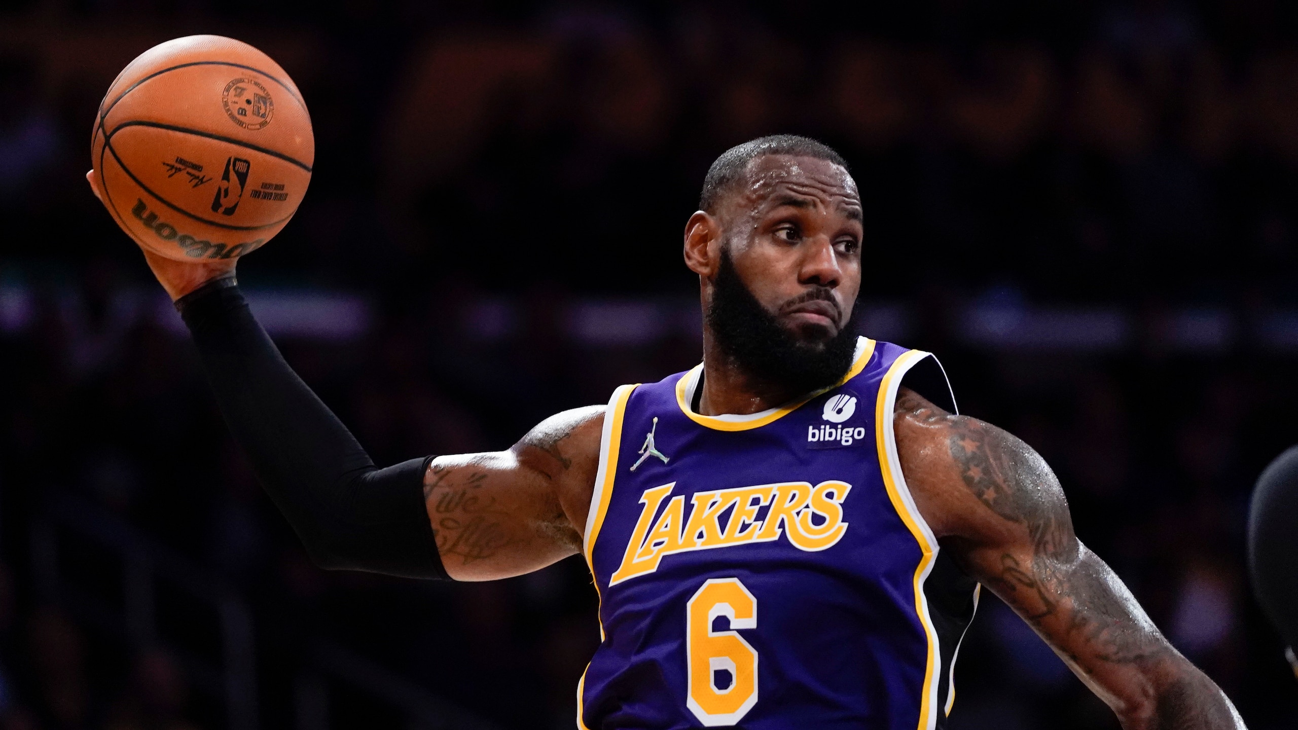 Los Angeles Lakers' LeBron James passes the ball during the second half of an NBA basketball game against the Cleveland Cavaliers Friday, Oct. 29, 2021, in Los Angeles. (AP Photo/Jae C. Hong)