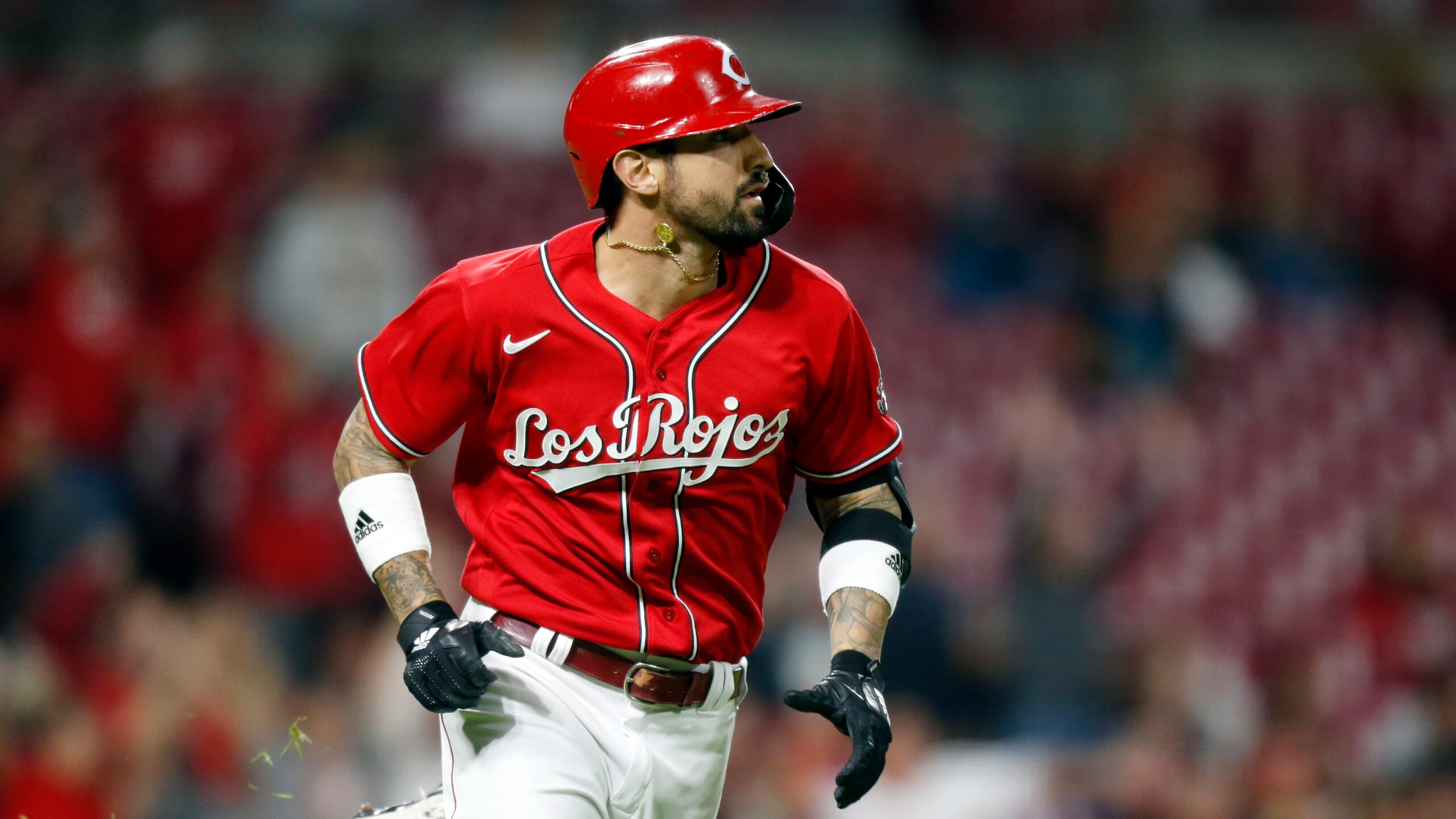 Cincinnati Reds' Nick Castellanos is seen after hitting a homerun during a baseball game against the Washington Nationals in Cincinnati Friday, Sept. 24, 2021. (AP Photo/Paul Vernon)