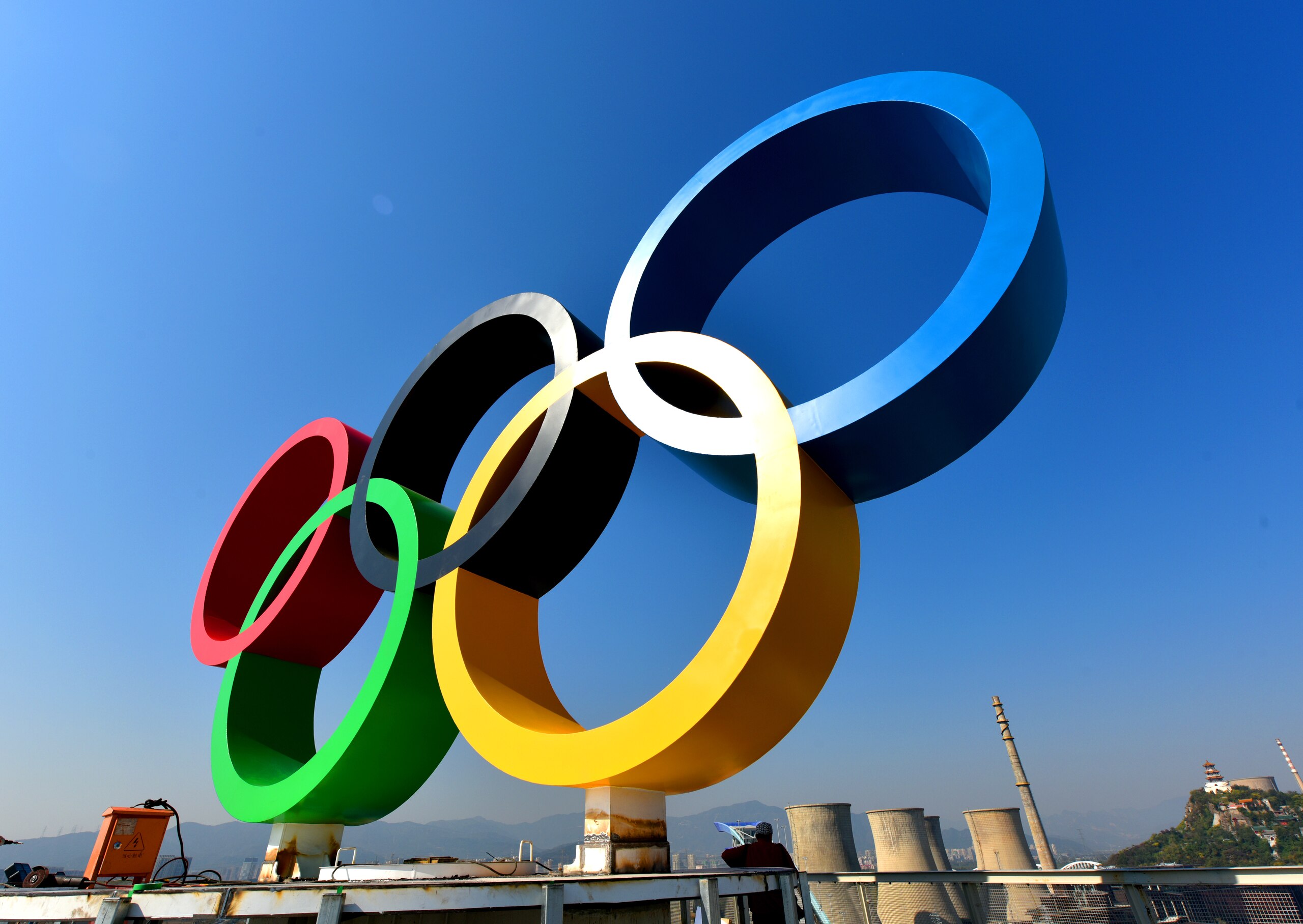 BEIJING, CHINA - OCTOBER 23: Olympic rings is seen at Shougang Park on October 23, 2021 in Beijing, China. The Big Air Shougang at Shougang Park will host the big air freestyle skiing and snowboarding competitions of the Beijing 2022 Winter Olympic Games. (Photo by Li Wenming/VCG via Getty Images) BEIJING, CHINA - OCTOBER 23: Olympic rings is seen at Shougang Park on October 23, 2021 in Beijing, China. The Big Air Shougang at Shougang Park will host the big air freestyle skiing and snowboarding competitions of the Beijing 2022 Winter Olympic Games. (Photo by Li Wenming/VCG via Getty Images)