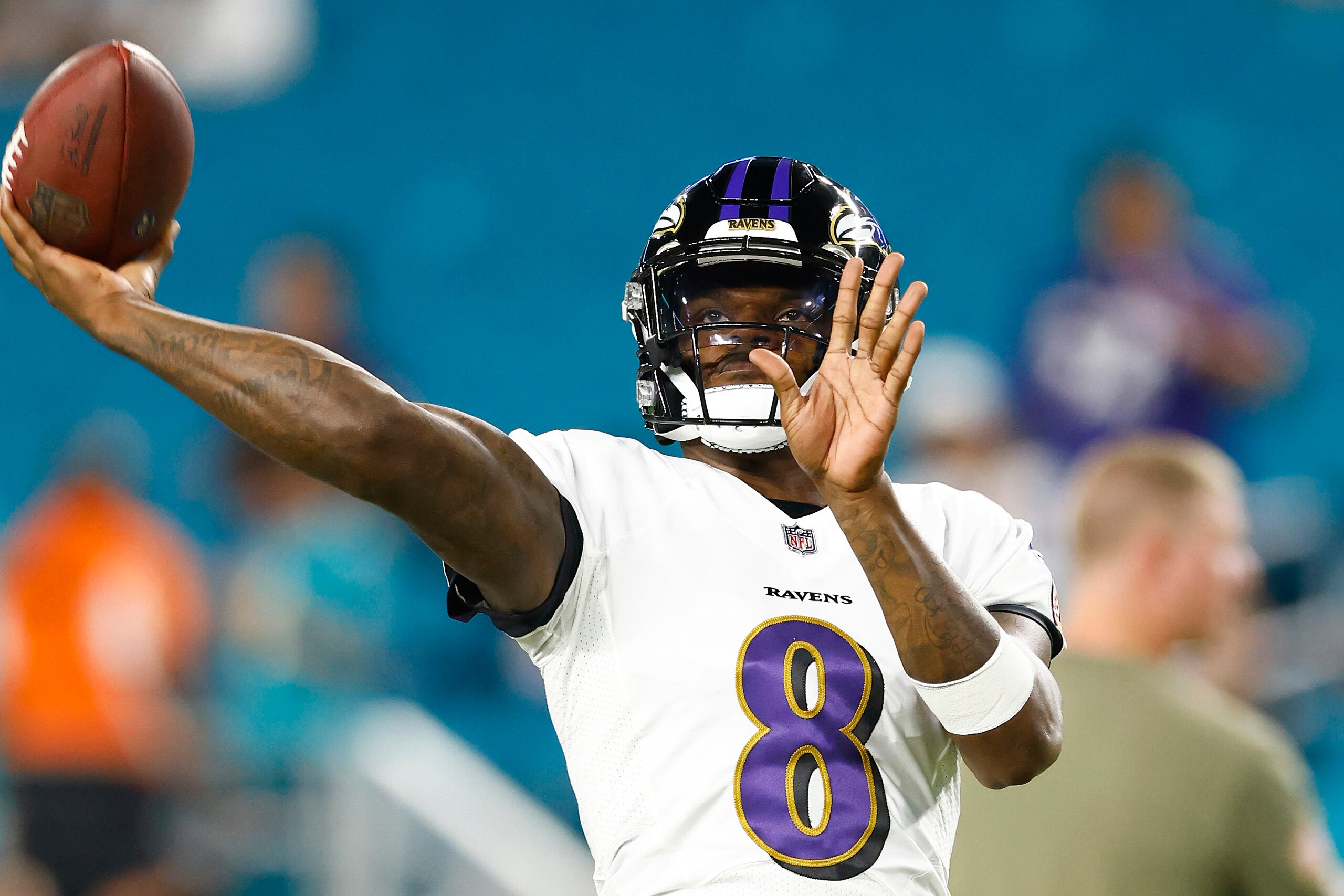 MIAMI GARDENS, FLORIDA - NOVEMBER 11: Lamar Jackson #8 of the Baltimore Ravens warms up prior to the game against the Miami Dolphins at Hard Rock Stadium on November 11, 2021 in Miami Gardens, Florida. (Photo by Michael Reaves/Getty Images)