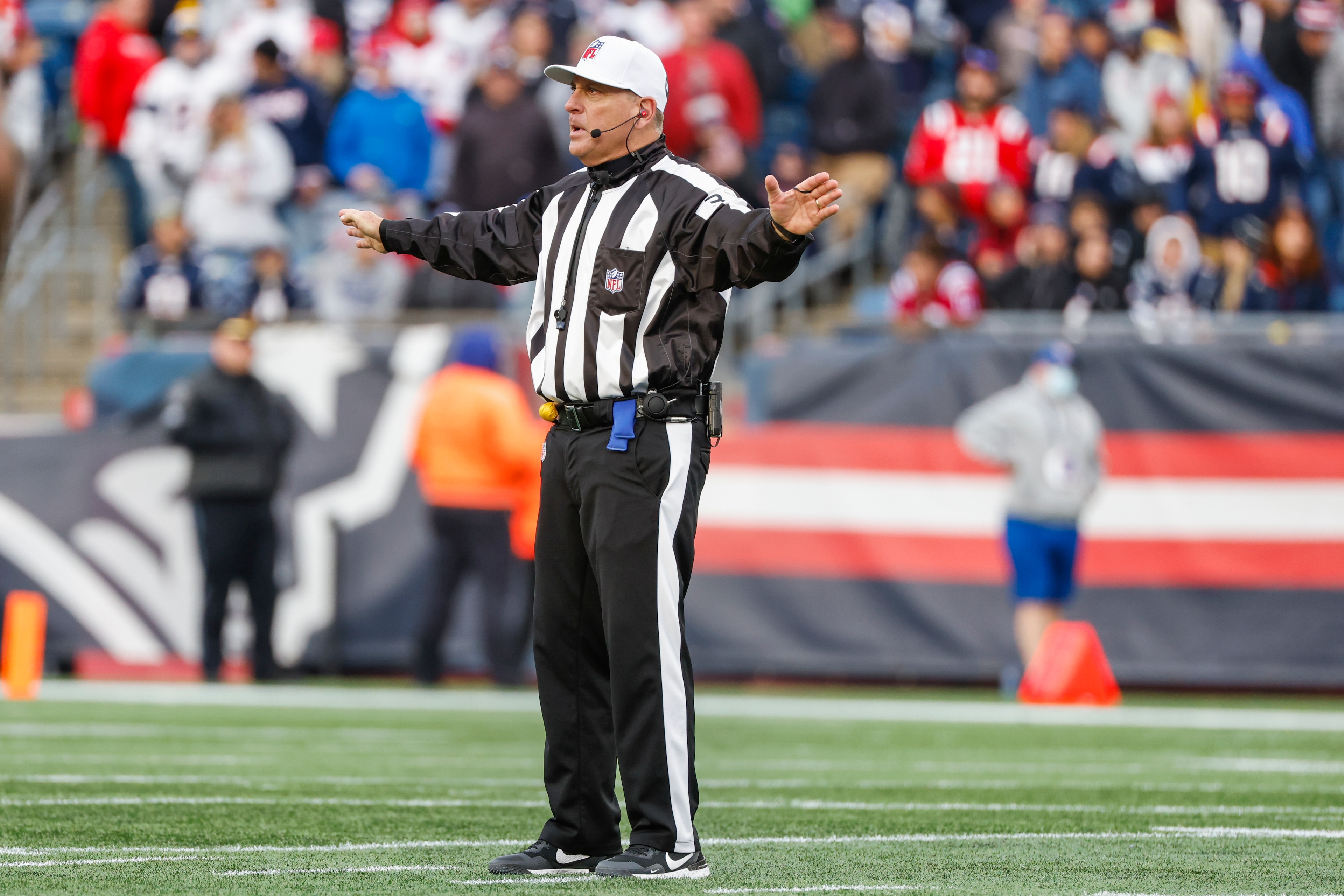 NFL referee John Hussey (35) officiates during the second half of an NFL football game, Sunday, Nov. 14, 2021, in Foxborough, Mass. (AP Photo/Greg M. Cooper)