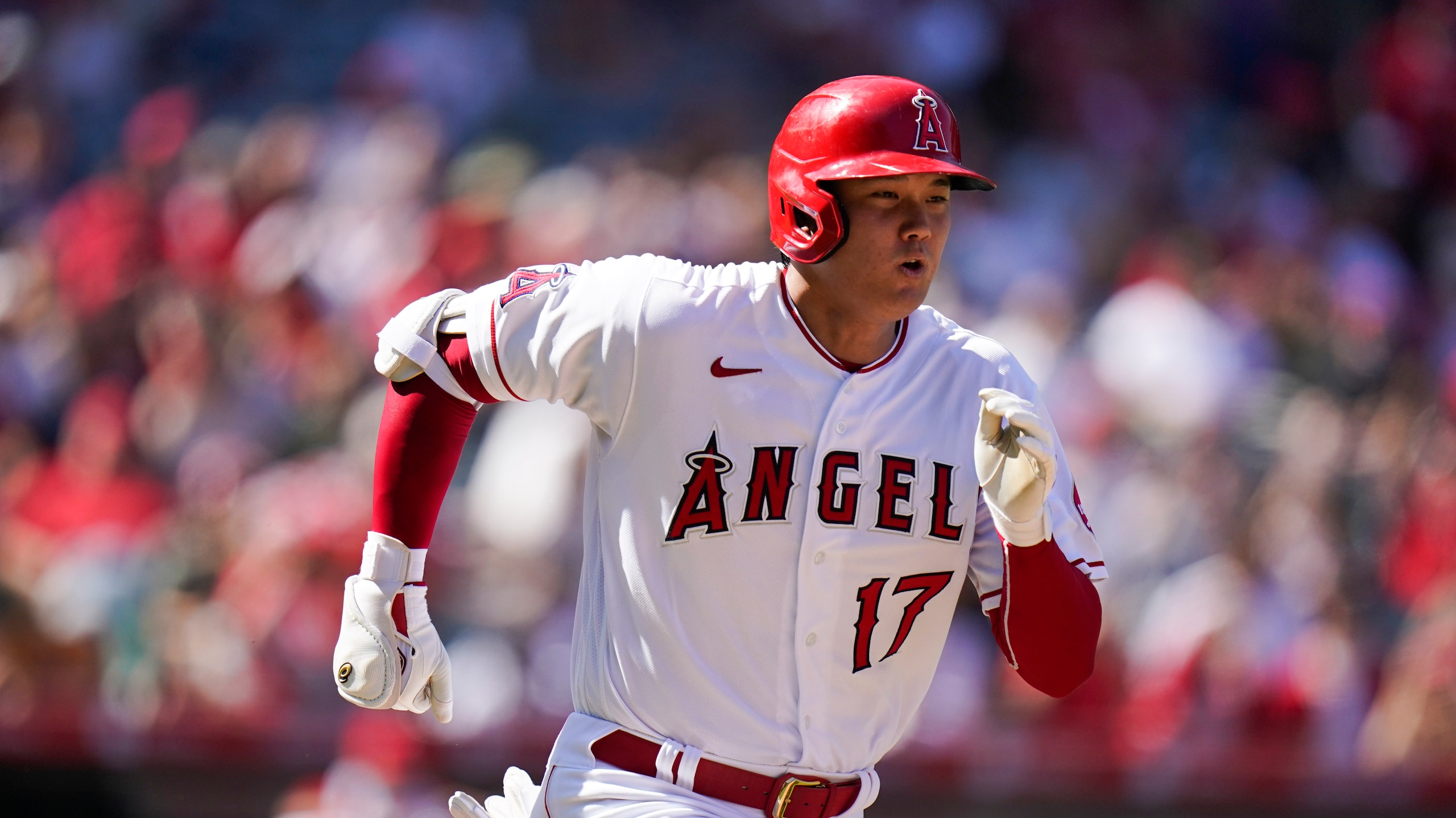 Los Angeles Angels designated hitter Shohei Ohtani runs to first base during a baseball game against the Oakland Athletics Monday, Sept. 20, 2021, in Anaheim, Calif. (AP Photo/Jae C. Hong)