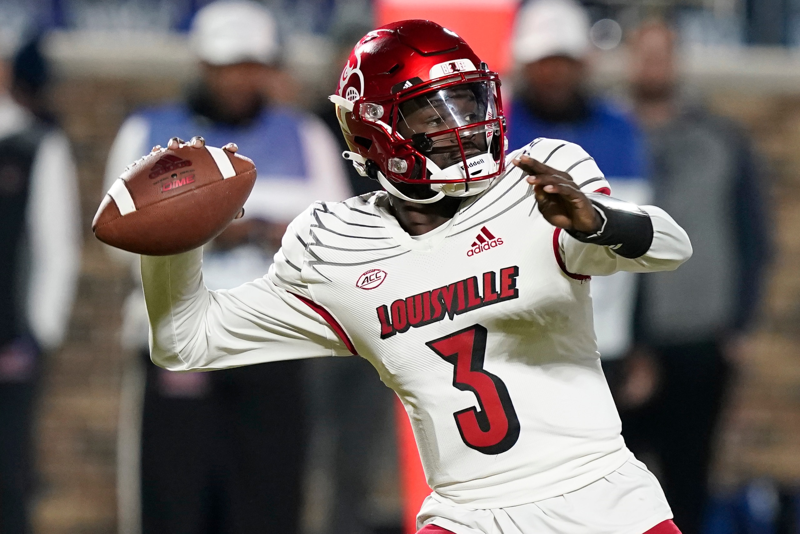 Louisville quarterback Malik Cunningham (3) looks to pass against Duke during the first half of an NCAA college football game in Durham, N.C., Thursday, Nov. 18, 2021. (AP Photo/Gerry Broome)
