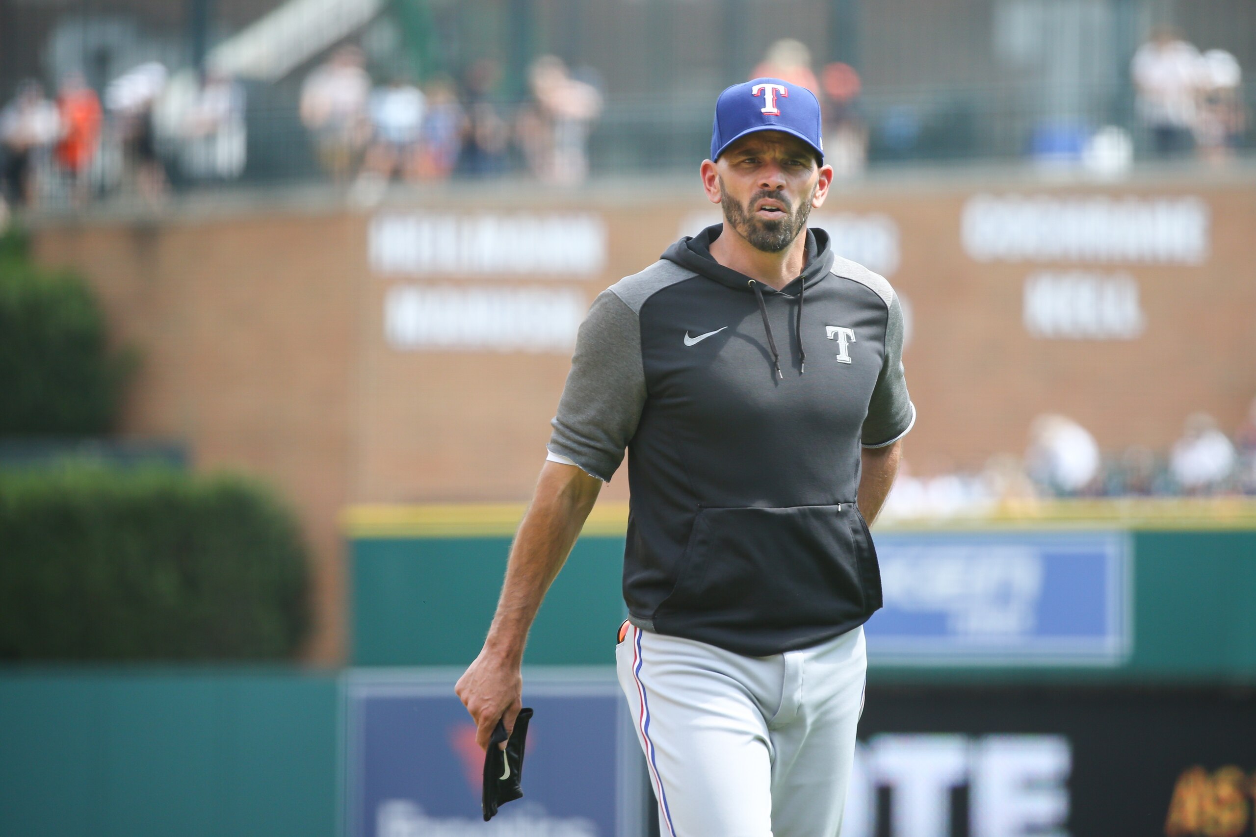 DETROIT, MI - JULY 22:  Texas Rangers manager Chris Woodward (8) looks on during a regular season Major League Baseball game between the Texas Rangers and the Detroit Tigers on July 22, 2021 at Comerica Park in Detroit, Michigan. (Photo by Scott W. Grau/Icon Sportswire via Getty Images)